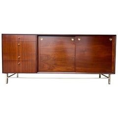 Refinished Mid Century Modern Twelf Drawer Dresser By John Stuart. Circa 1960s.