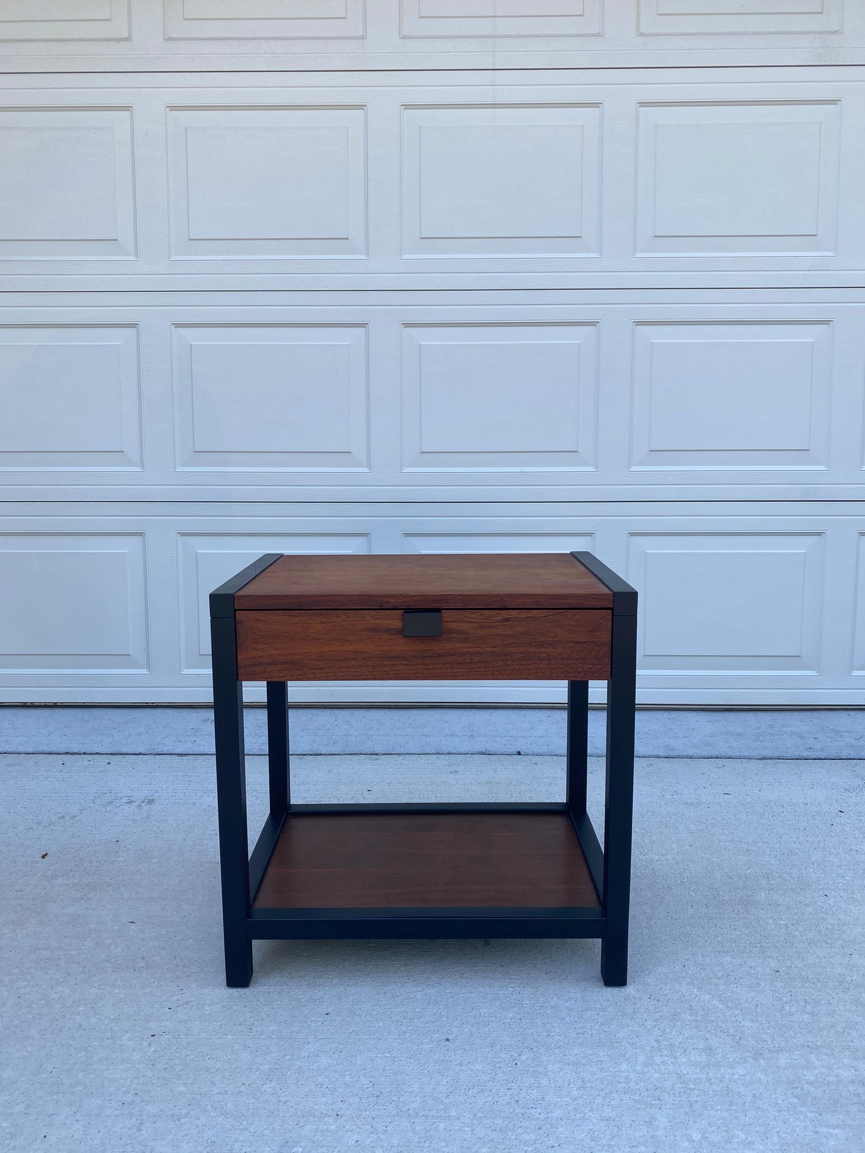 Partially refinished, Milo Baughman for Directional Gentlemen's nightstand. Features contrasting black frame with walnut wood. This amazing piece is amazing to add to any bedroom.

 