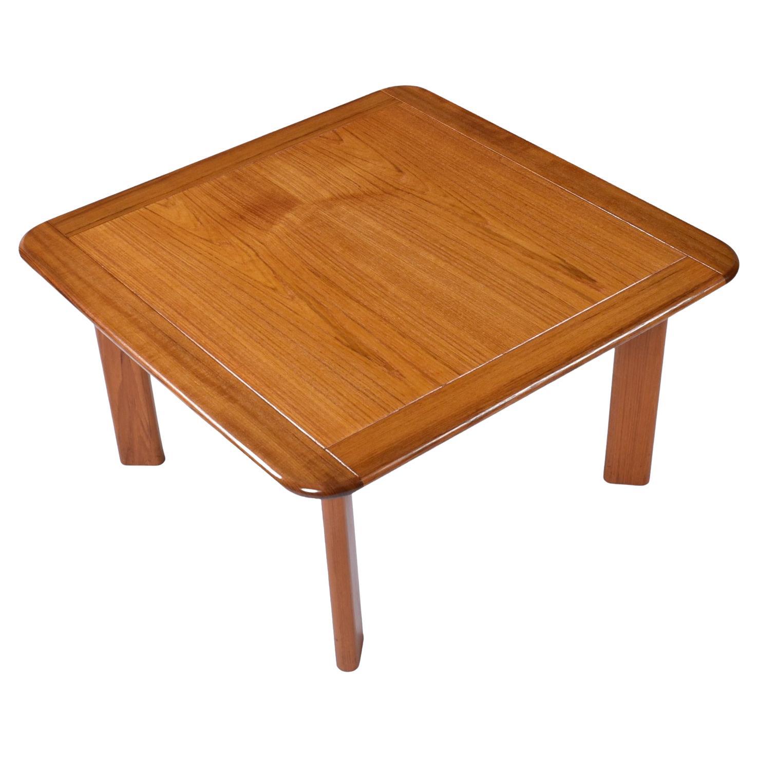 Premium quality vintage Danish Modern square coffee table or large side table. This piece is built like a champ! Outstanding quality, solid teak throughout. The Danish Modern coffee table is 36.5″ square and could be used as a large side table. The