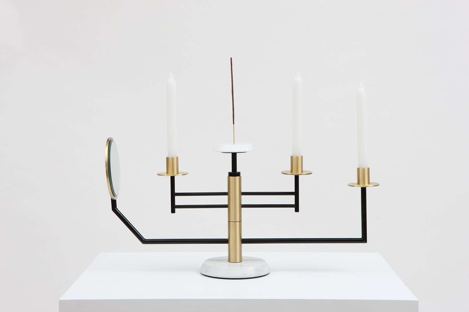 The Reflect candelabra
A candelabra that does more than just contain a flame. “Reflect” creates a sensory experience which brings light to our vision, touch, and smell. Through different levels of separation and a central axis of rotation, one is