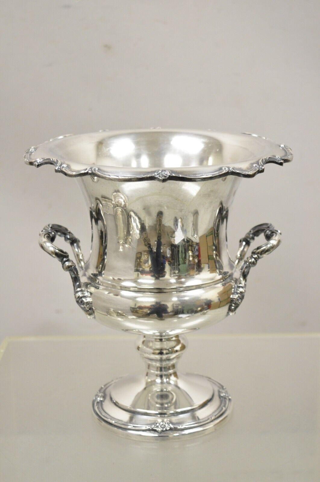 Vintage Reflection 1847 Rogers Bros Silver Plated Trophy Cup Champagne Chiller Ice Bucket. Item features a nice tall form, raised pedestal base, original hallmark, very nice vintage item, great style and form. Circa Mid to Late 20th Century.