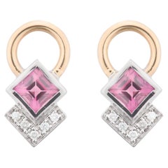 Boucles d
oreilles "Reflection" en or blanc et rose avec Brilliantes H SI 1 et Tourmaline.