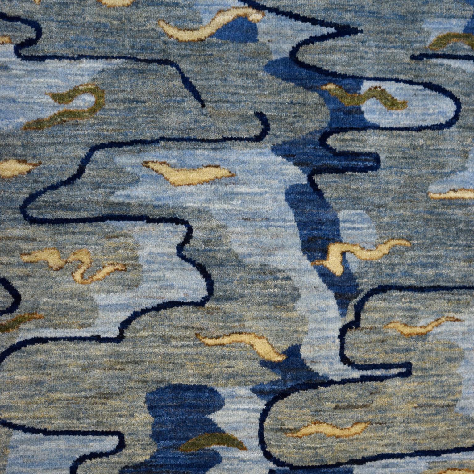 Rippling gently across a lake’s surface before colliding with the shoreline and stylized plant motifs, this hand-knotted carpet, titled Reflections, measures 4’11” x 6’8” and belongs to the Orley Shabahang Art Nouveau collection. The composition of