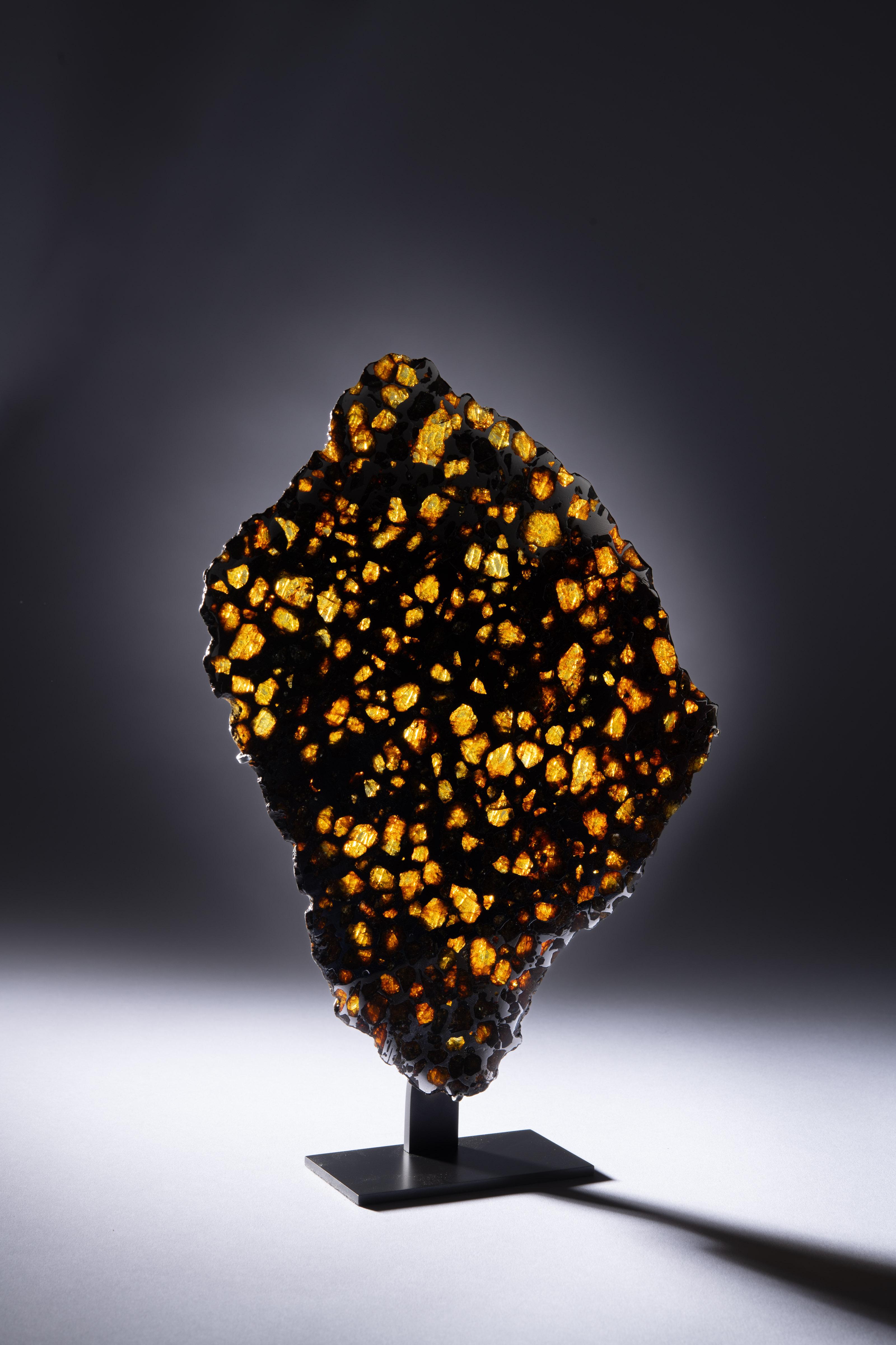 18th Century and Earlier Reflective Meteorite Slice with Peridot Crystals For Sale