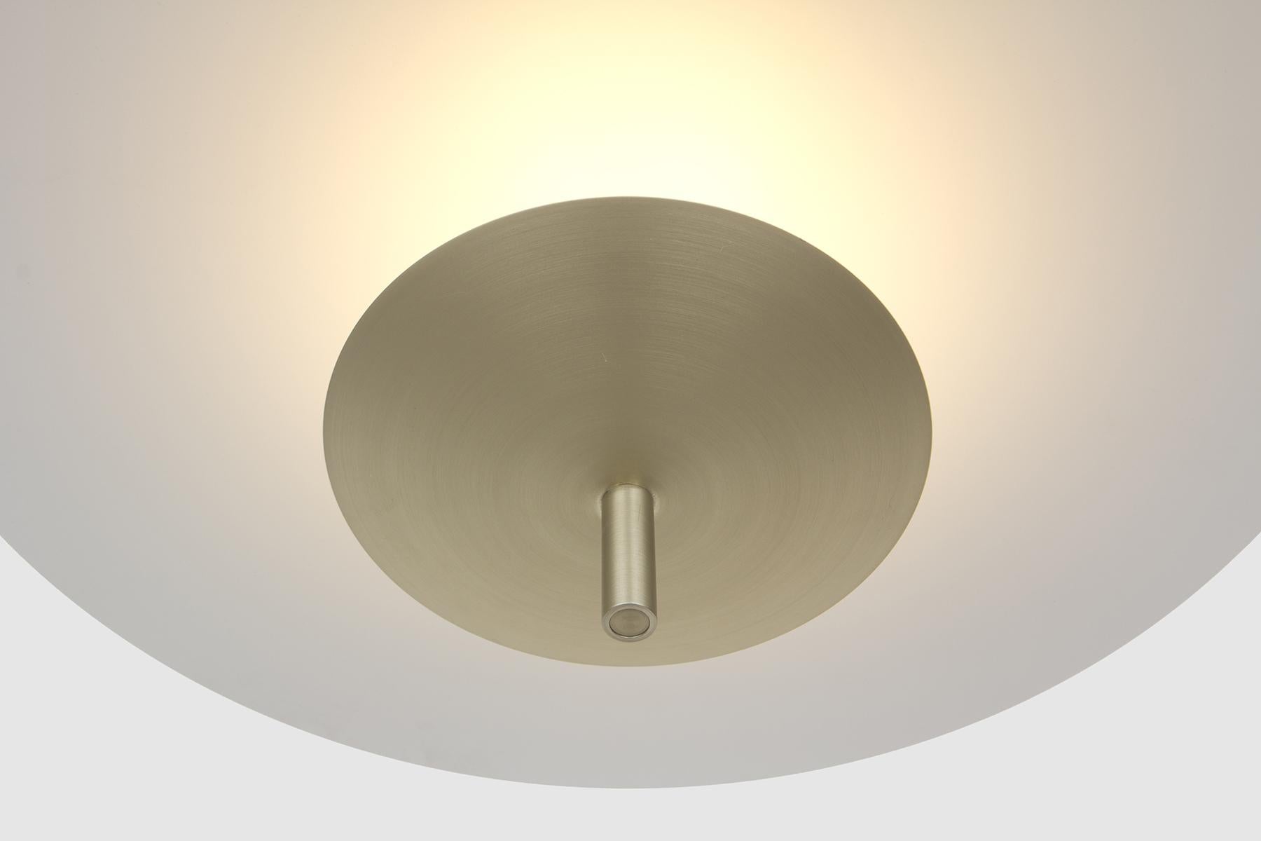 The Reflector pendant is a sophisticated soft lighting option suited for dining tables, workspaces, hallways and other indoor environments that require a diffused and warm lighting experience. 

Light is cast onto a floating reflector, washing the