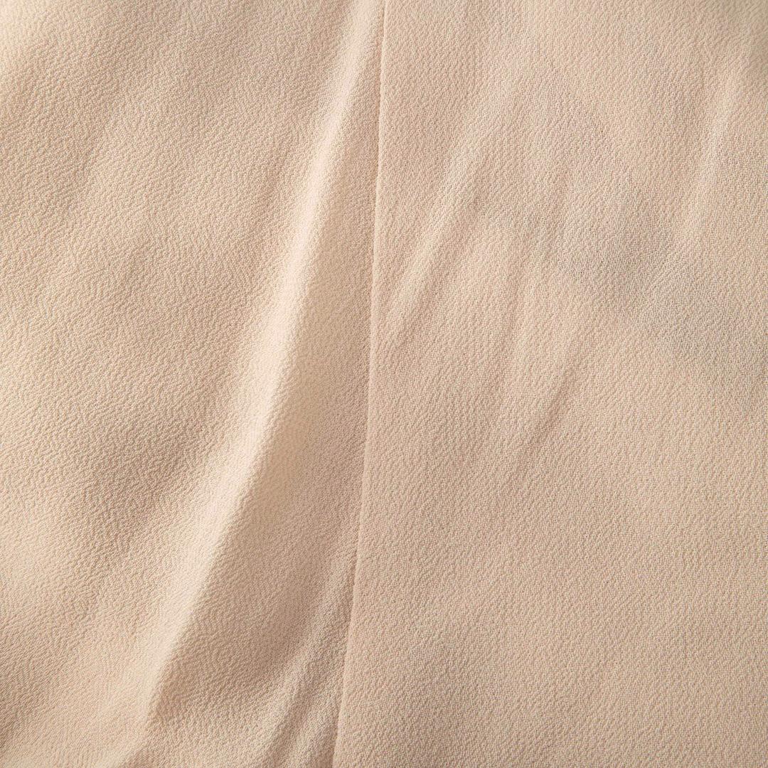 Beige Robe longue beige à nœuds de Reformation Taille XS en vente