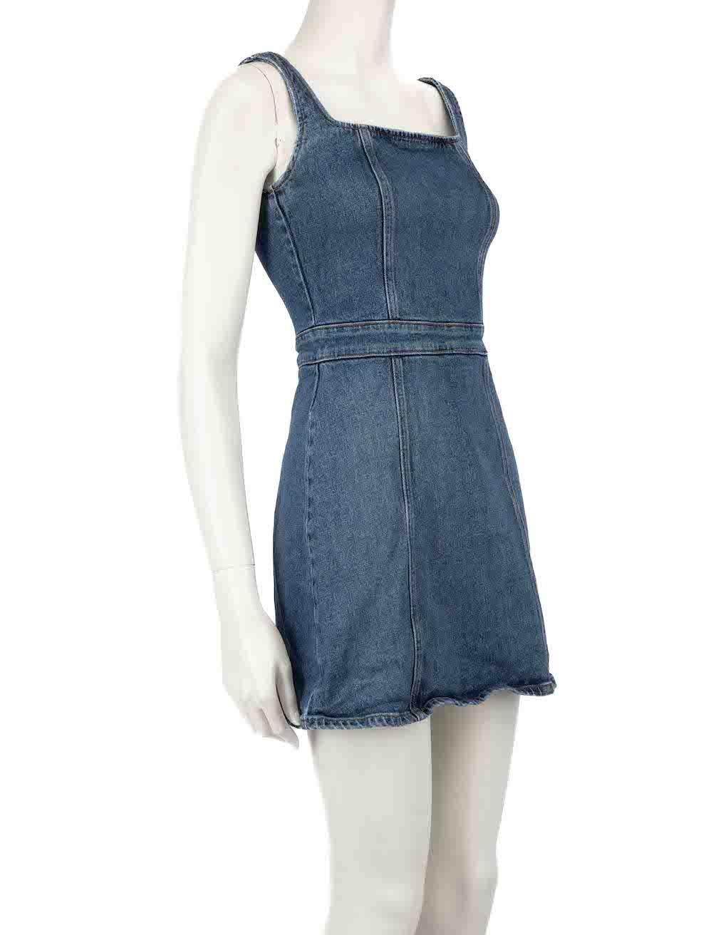 CONDITION is Good. Minor wear to dress is evident. Light wear to the neckline and underarms with plucks to the denim trim on this used Reformation designer resale item.
 
Details
Parker model
Blue
Denim
Mini dress
Square neckline
Back zip closure
