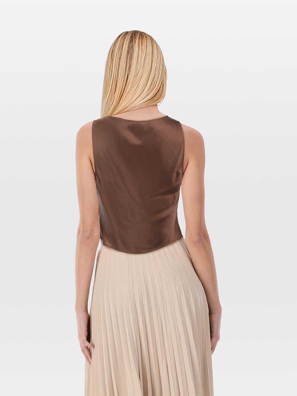 CONDITION is Very good. Minimal wear to the top is evident. Fraying to the fabric on the left arm hole on this used Reformation designer resale item.
 
 
 
 Details
 
 
 Brown 
 
 Synthetic
 
 Top
 
 Sleeveless
 
 V neck
 
 Satin texture
 
 
 
 Made