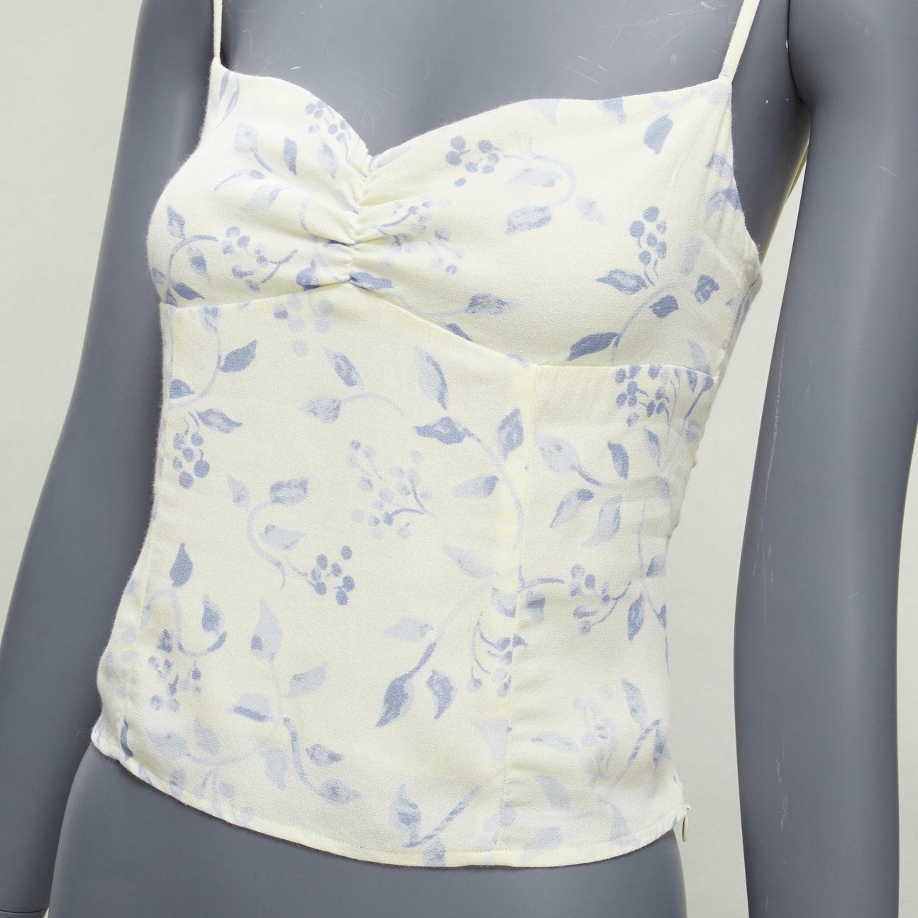 REFORMATION cream blue floral print retro ruched tank top US2 S
Reference: SNKO/A00395
Brand: Reformation
Material: Viscose
Color: Cream, Blue
Pattern: Floral
Closure: Elasticated
Lining: Cream Fabric
Extra Details: Elasticated back.
Made in: United