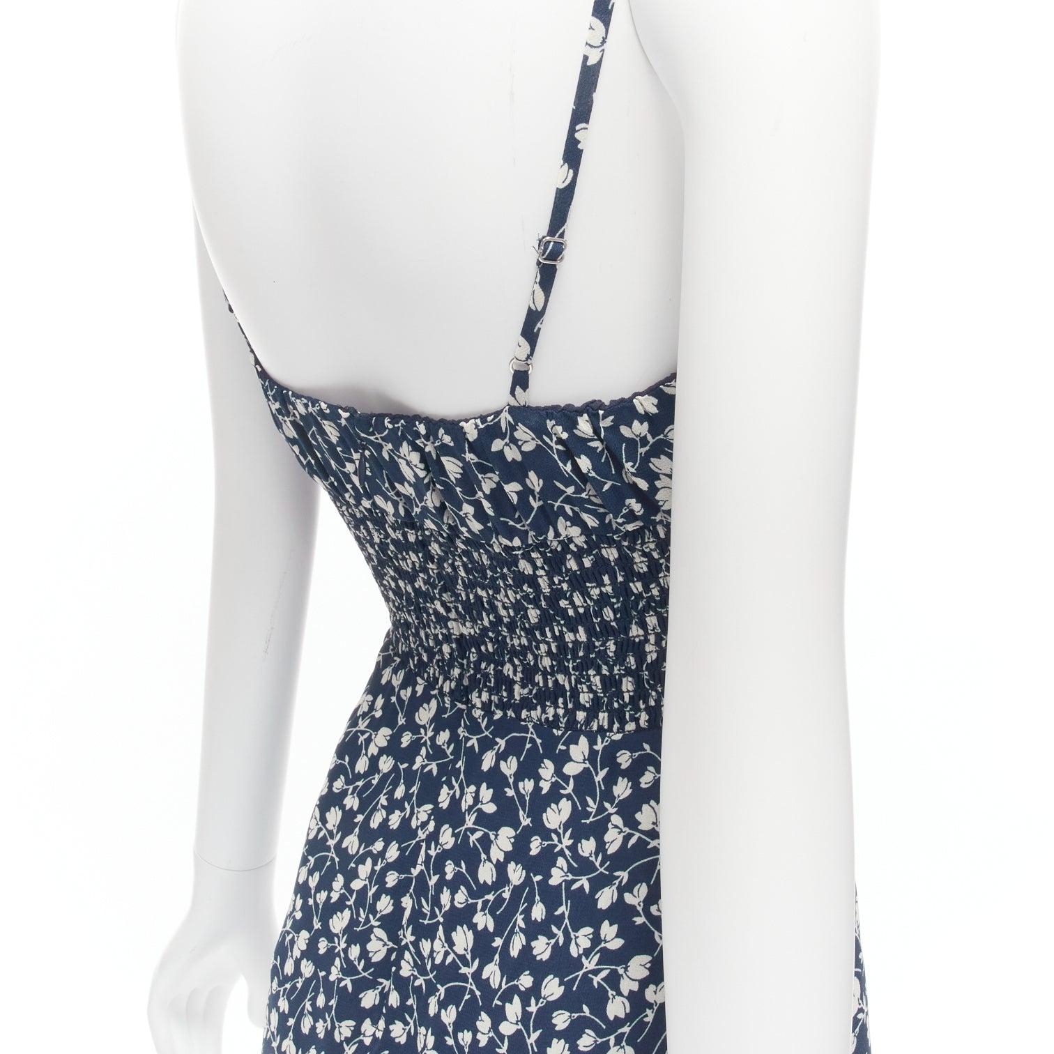 REFORMATION Elyse white navy floral print smocked bodice mini dress US2 S
Reference: SNKO/A00401
Brand: Reformation
Model: Elyse
Material: Viscose, Blend
Color: Navy, White
Pattern: Floral
Closure: Zip
Made in: United States

CONDITION:
Condition: