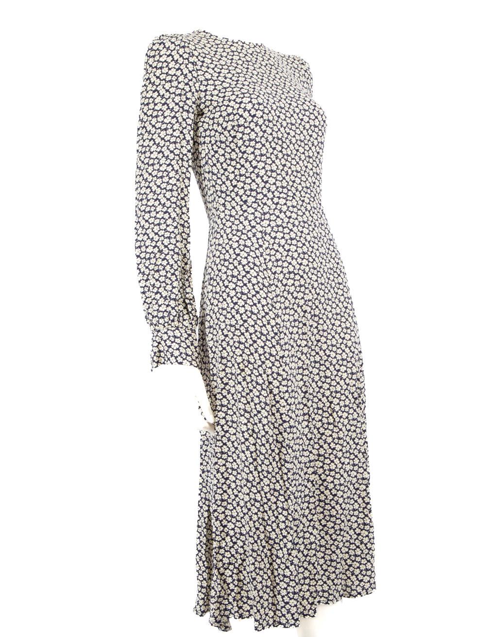 CONDITION is Very good. Minimal wear to dress is evident. Minimal wear to dress with minor discolouration along neckline and a couple of frayed threads along back right inside lining on this used Reformation designer resale item.
 Details
