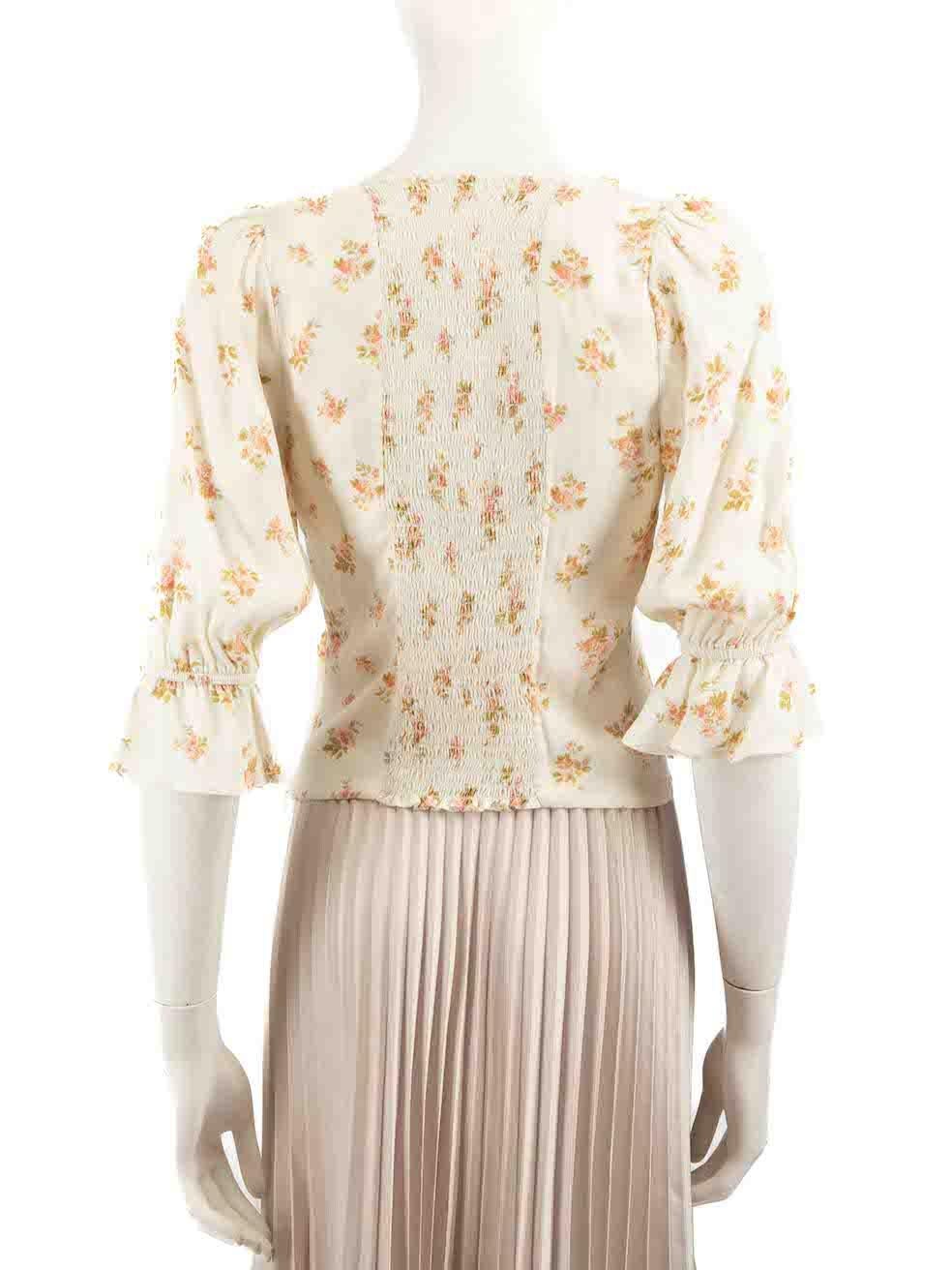 Blanc Haut élastique à imprimé floral Reformation, taille S en vente