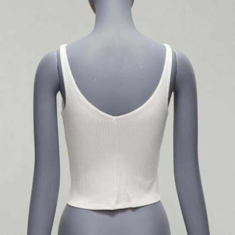 Donna REFORMATION Giorgia crema, conchiglia a coste con passanti per il collo a V XS in vendita