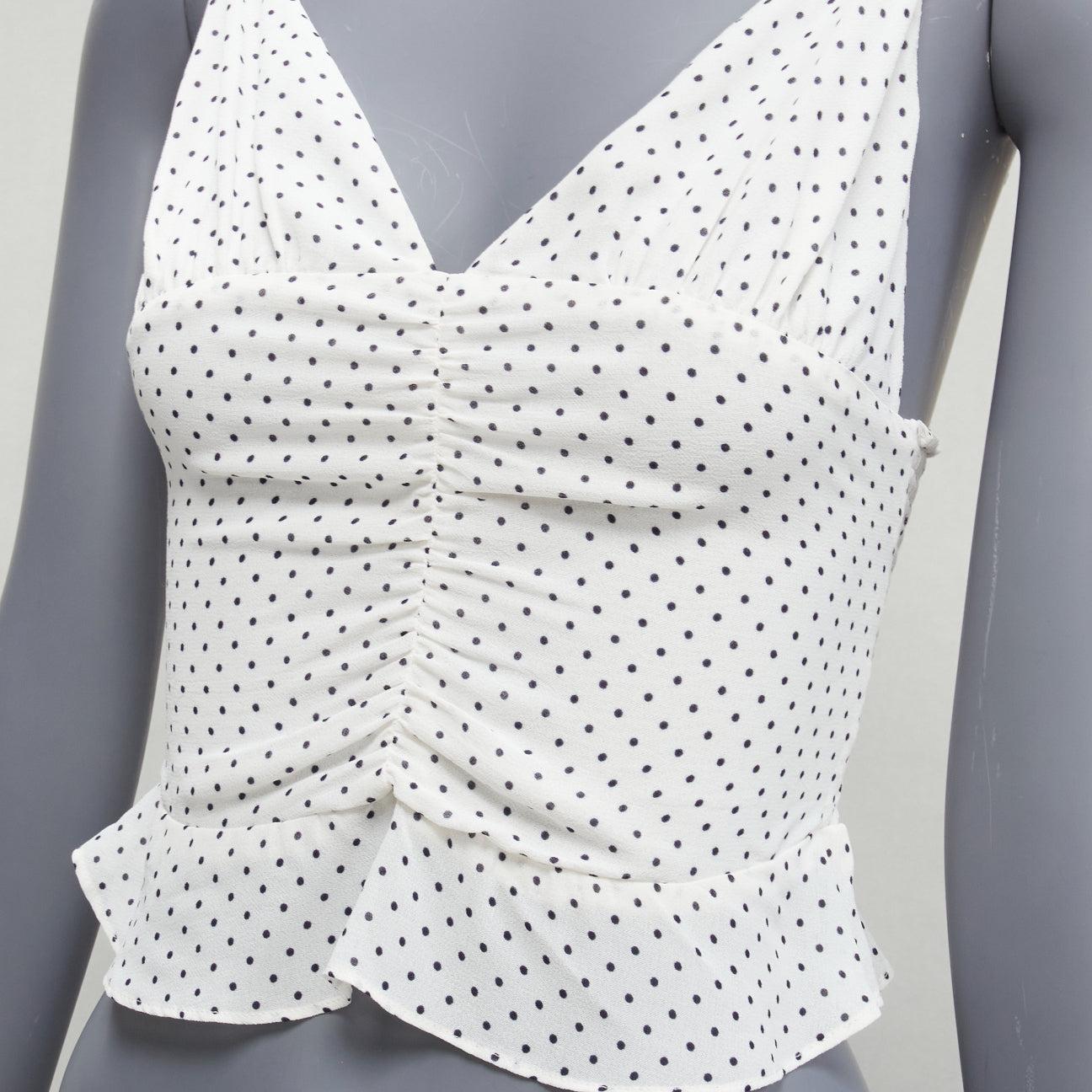 REFORMATION Hall white polka dot V neck retro ruched tank top US0 XS
Reference: SNKO/A00396
Brand: Reformation
Model: Hall
Material: Viscose
Color: White, Black
Pattern: Polka Dot
Closure: Zip
Lining: White Fabric
Extra Details: Elasticated back