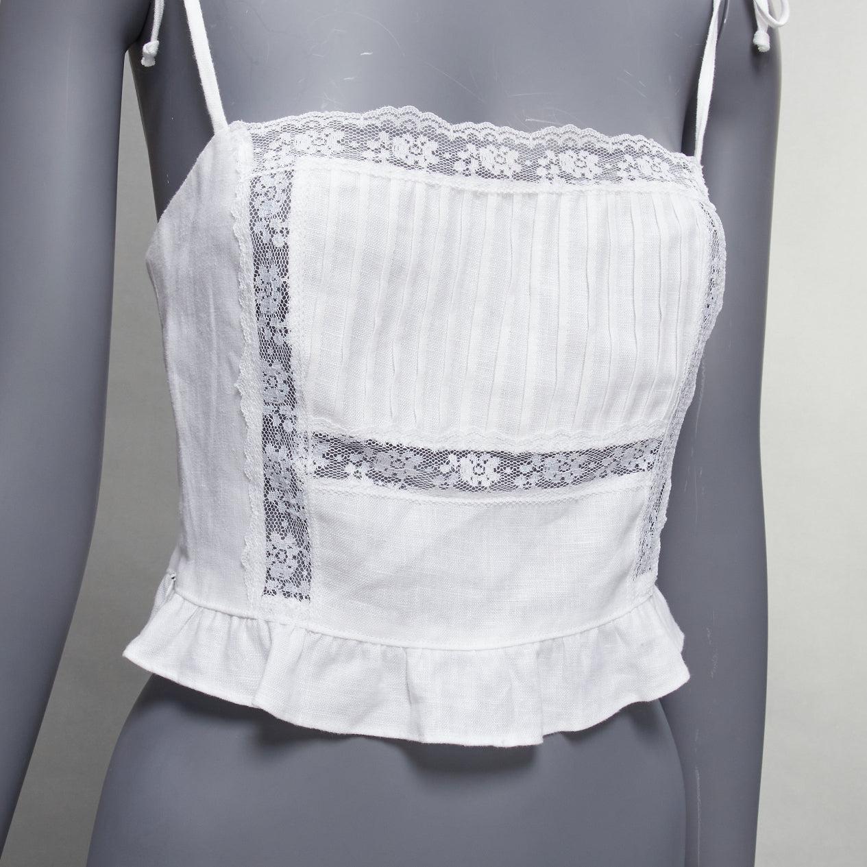 REFORMATION Mason white pleated lace trim ruffle tie strap vest US0 XS
Reference: SNKO/A00393
Brand: Reformation
Model: Mason
Material: Linen
Color: White
Pattern: Solid
Closure: Self Tie
Lining: White Fabric
Extra Details: White linen Mason crop
