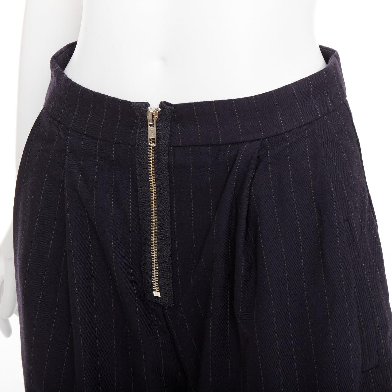 REFORMATION navy pinstripe surplus fabric silver zip fly wide pants US0 XS
Reference: ECLO/A00206
Brand: Reformation
Material: Fabric
Color: Navy, White
Pattern: Pinstriped
Closure: Zip
Extra Details: Front zip fly.
Made in: United
