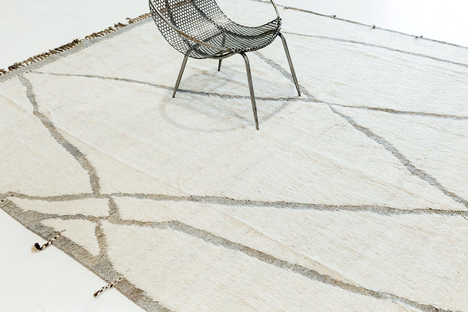 Azilal tribal rugs from Morocco are noted for their handspun wool, saturated color, intuitive motifs and charmingly irregular surface. Mehraban's Atlas Collection includes Azilal originals and contemporary interpretations. This handwoven rug is a