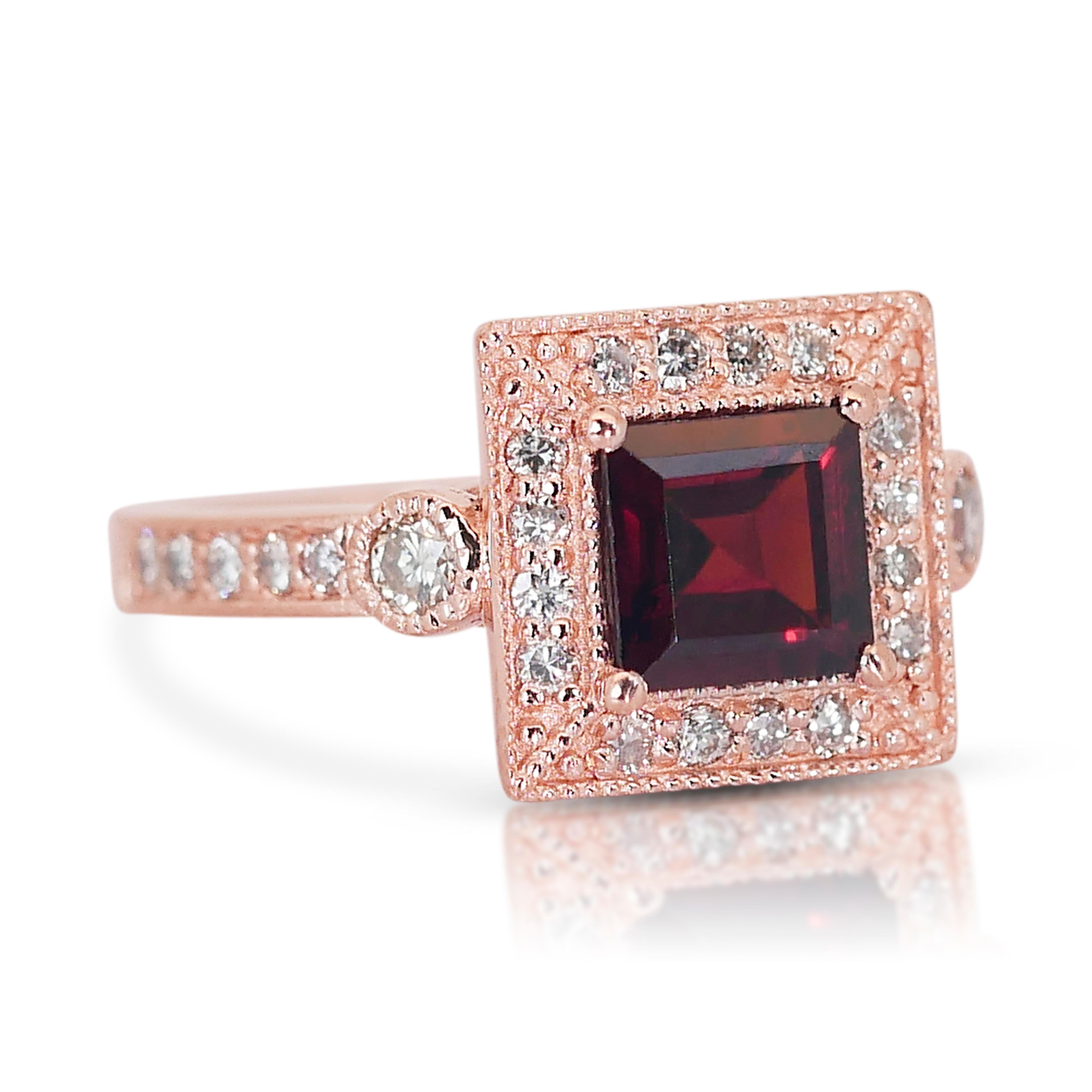 Regal 14K Rose Gold Natural Garnet Ring w/1.88ct  

Crafted with precision and passion, this ring weighs 4.60 grams, embodying both durability and grace. Its total carat weight, including the surrounding accent stones, is a generous 1.88 carats,