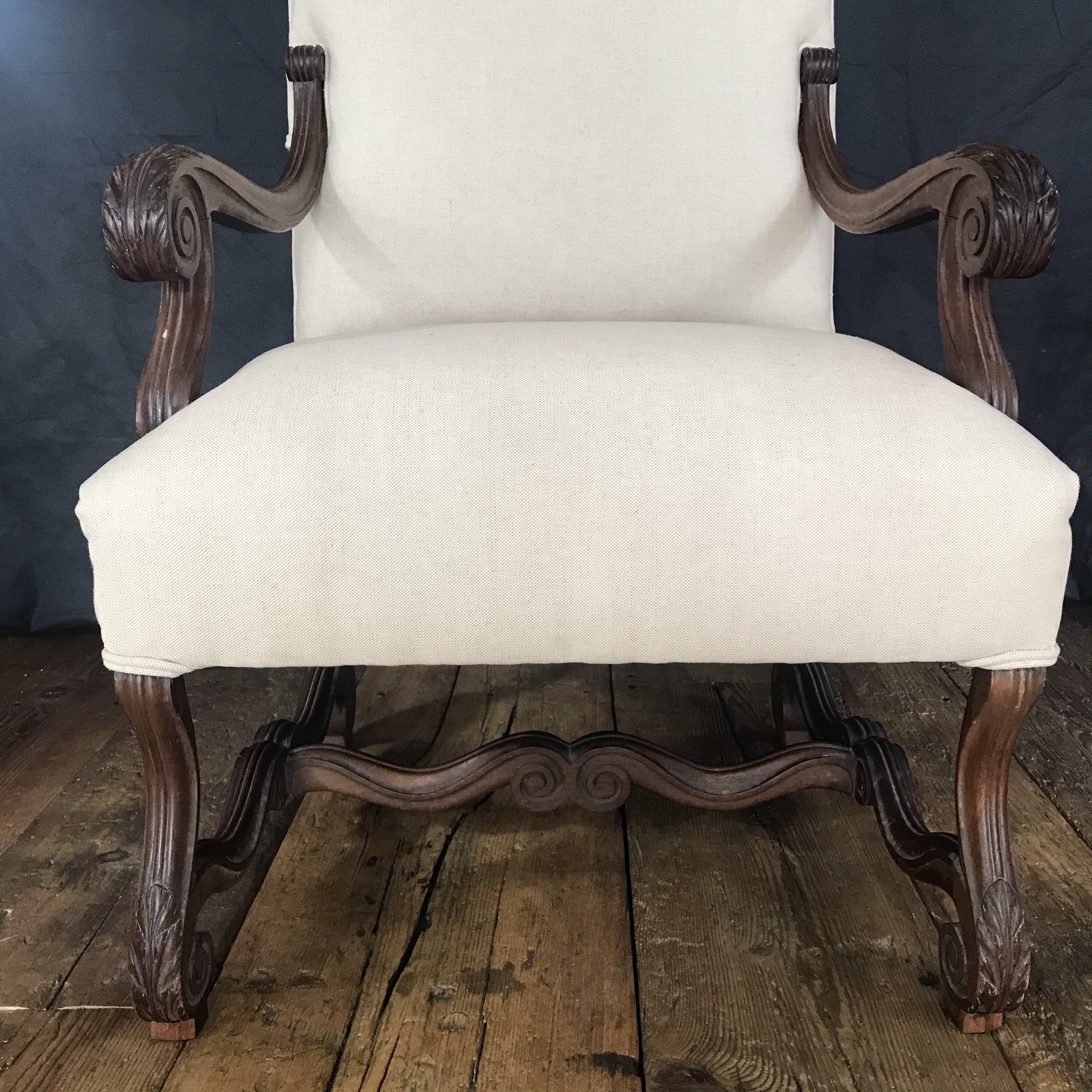 Beautiful French walnut Louis XV armchair with creamy new upholstery will look beautiful at the end of a dining table or in any living room or bedroom.

#4650.