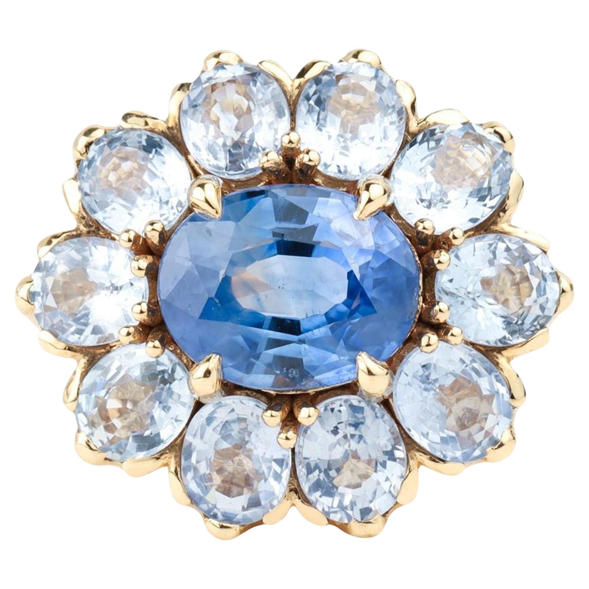 Regal Anillo de compromiso con halo de zafiro azul natural talla oval de 3 ct en oro amarillo de 18 quilates en venta