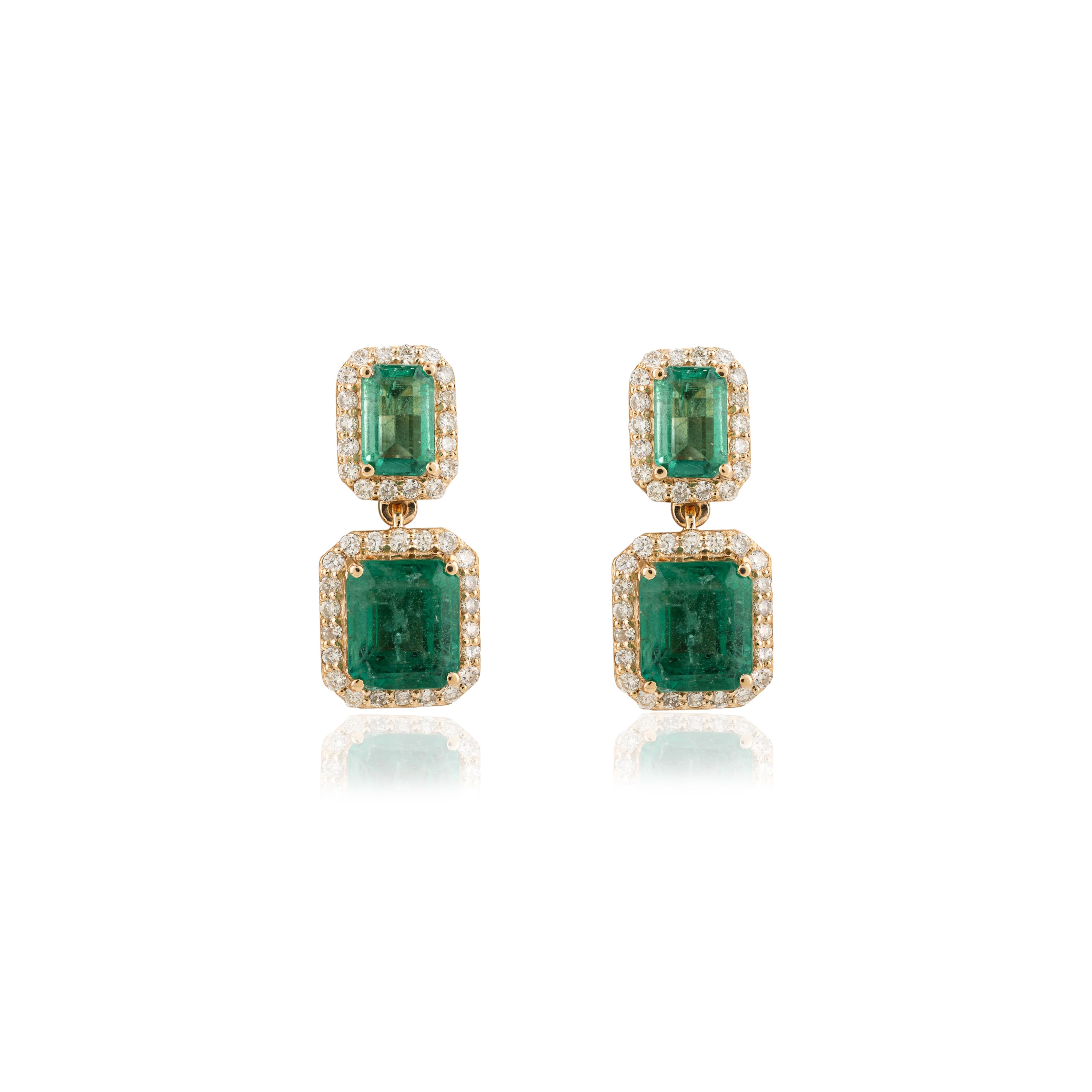 Art Deco Regal Emerald and Diamond Halo Engagement Dangle Earrings in 18k Yellow Gold For Sale
