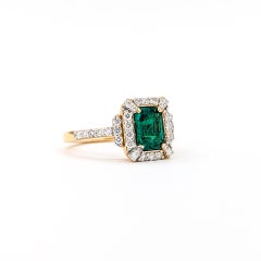 Regal Emerald & Diamond Halo Ring in Platinum