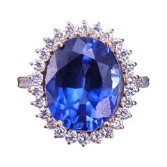 Regale anello aureolato ovale con zaffiro e diamante