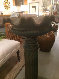 Regal Pair of 19th Century Iron Planters with Fluted Reservoirs