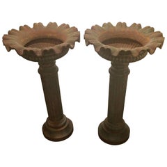 Regal Pair of 19th Century Iron Planters with Fluted Reservoirs