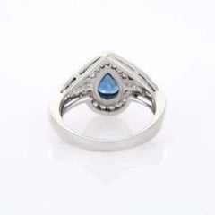 Regal Pear Cut Sapphire Diamond Wedding Ring in 18K White Gold
