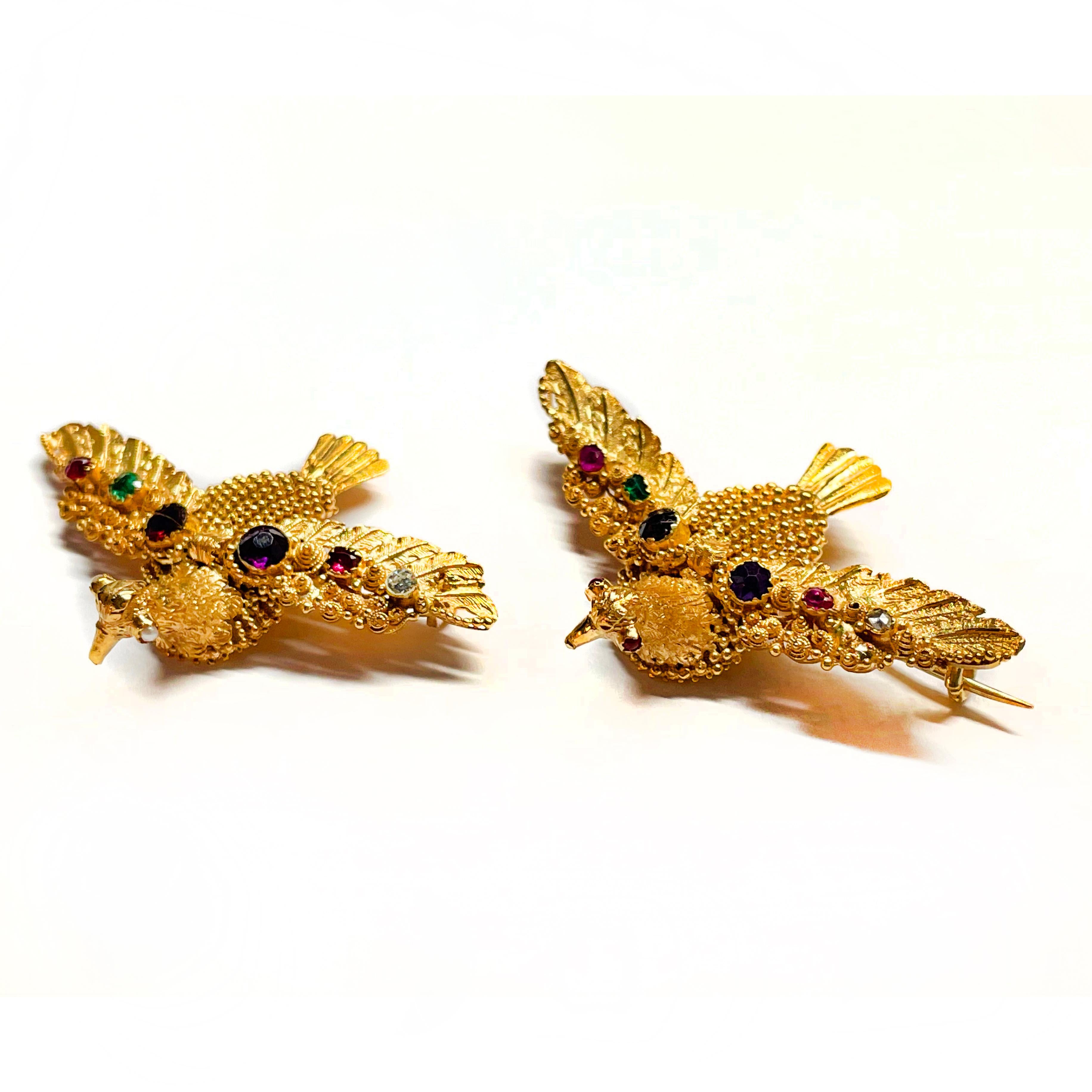 Rare Pair of Georgian REGARD Turtle Dove Brooches, ca. 1820s

A symbolic and museum-collectable example of acrostic jewels, featuring two doves, mounted with various gemstones, where the gems spell out 