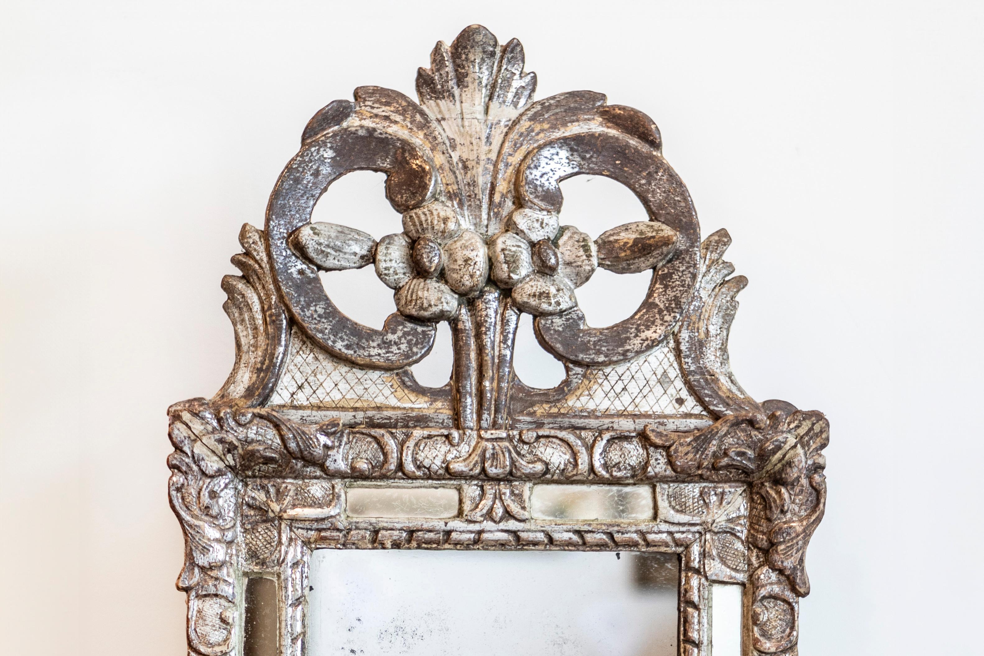 Hand-Carved Régence 18th Century French Silver Parcel Gilt Mirror with Floral Carved Crest For Sale