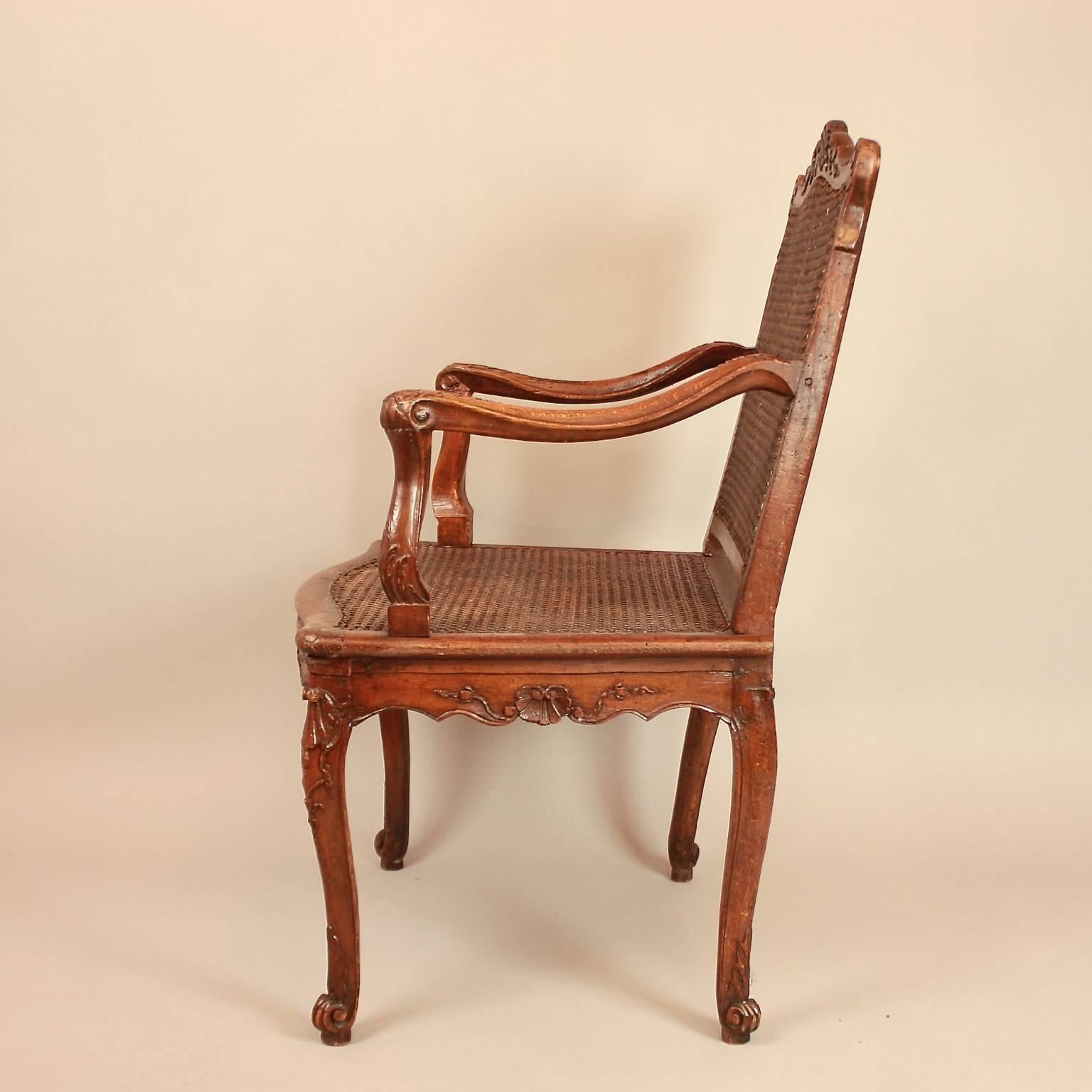 Oak Regence Carved and Caned Armchair or Fauteuil, circa 1720