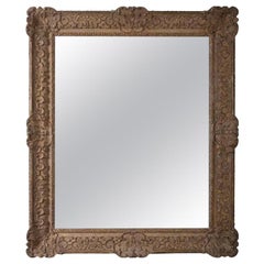 Miroir en bois doré de style Régence