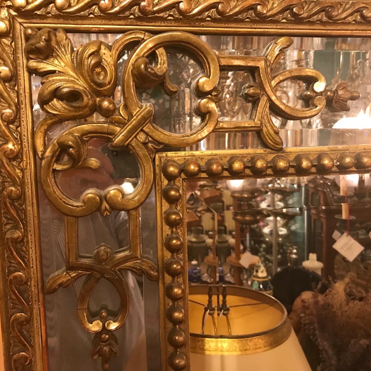 Regence Style Large Carved Giltwood Mirror  In Good Condition For Sale In Montreal, QC
