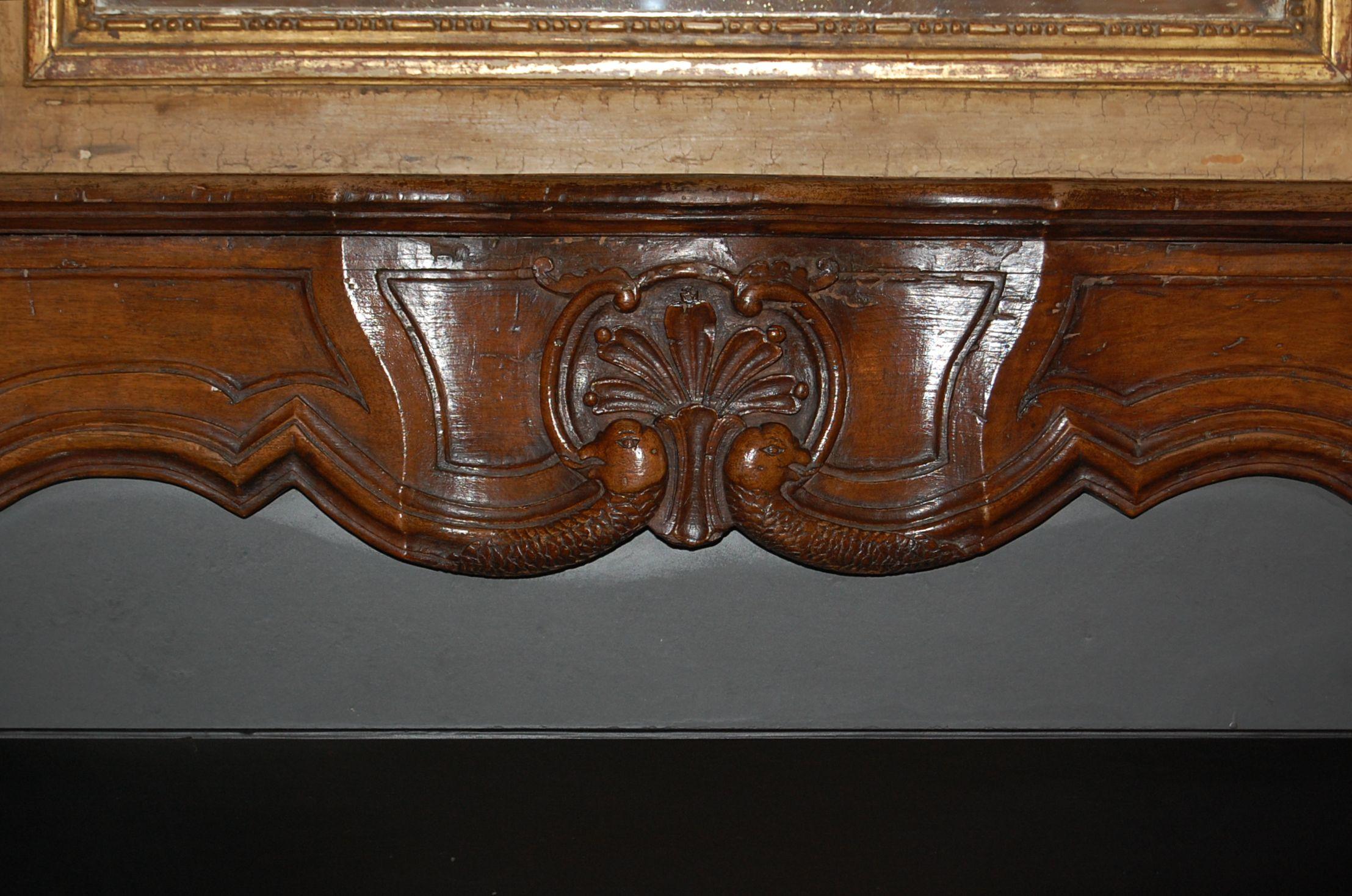 French Régence Period Carved Walnut Serpentine Fireplace Mantel, circa 1715 For Sale