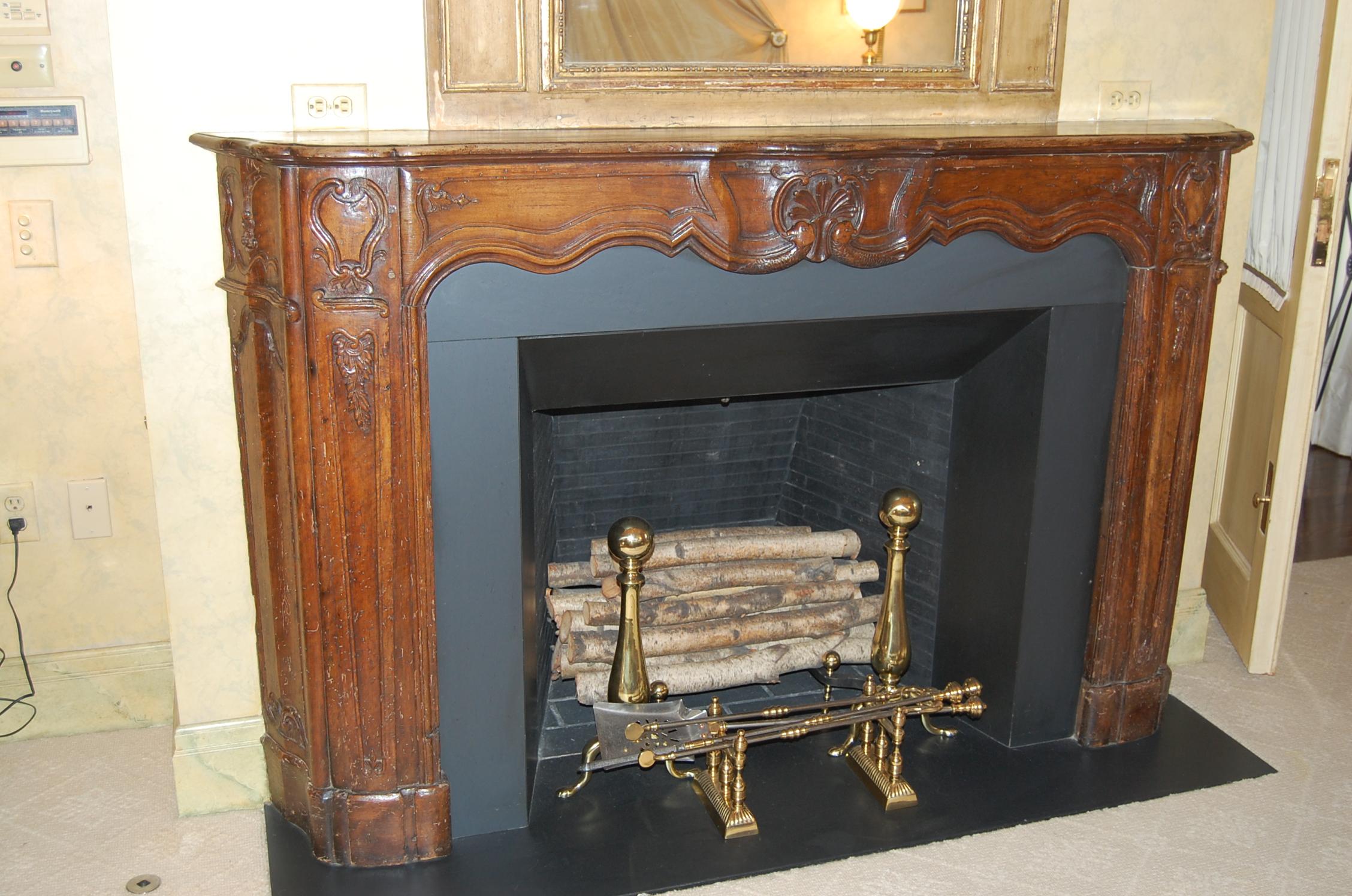 Hand-Carved Régence Period Carved Walnut Serpentine Fireplace Mantel, circa 1715 For Sale