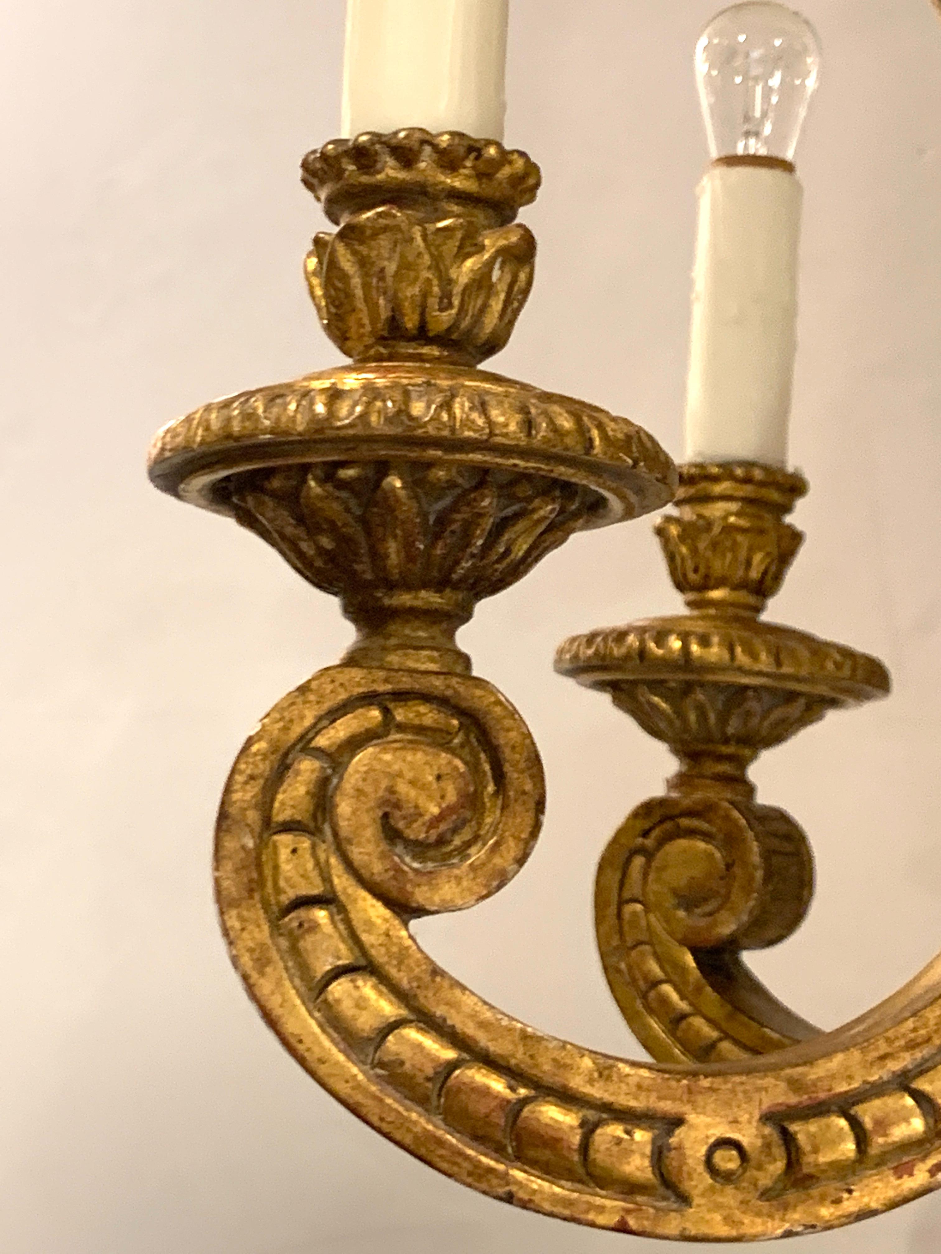 French Regence Style Carved Giltwood Chandelier, 18 Lights For Sale
