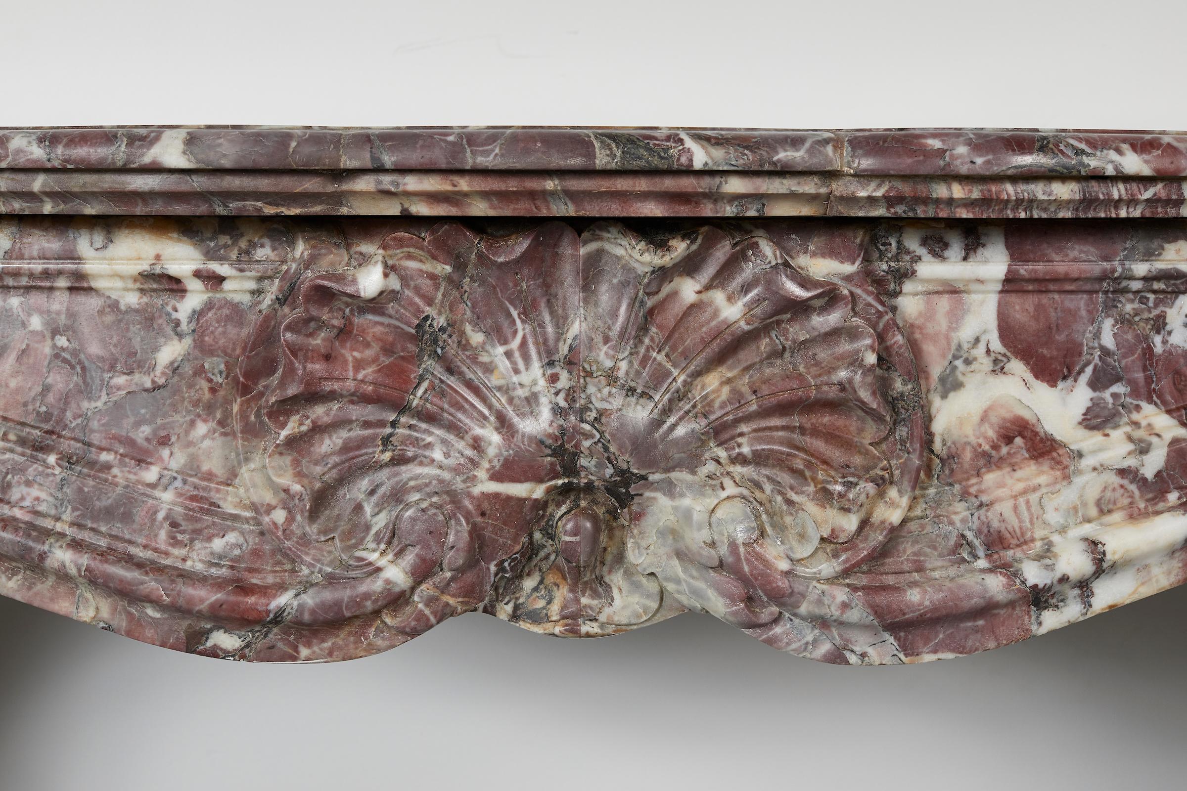 Regence style Fleur de Pecher marble mantel
Interior dimensions: H 36, W 47.5 in.