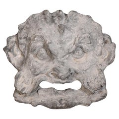 Regence-style lead grotesque fountain mask