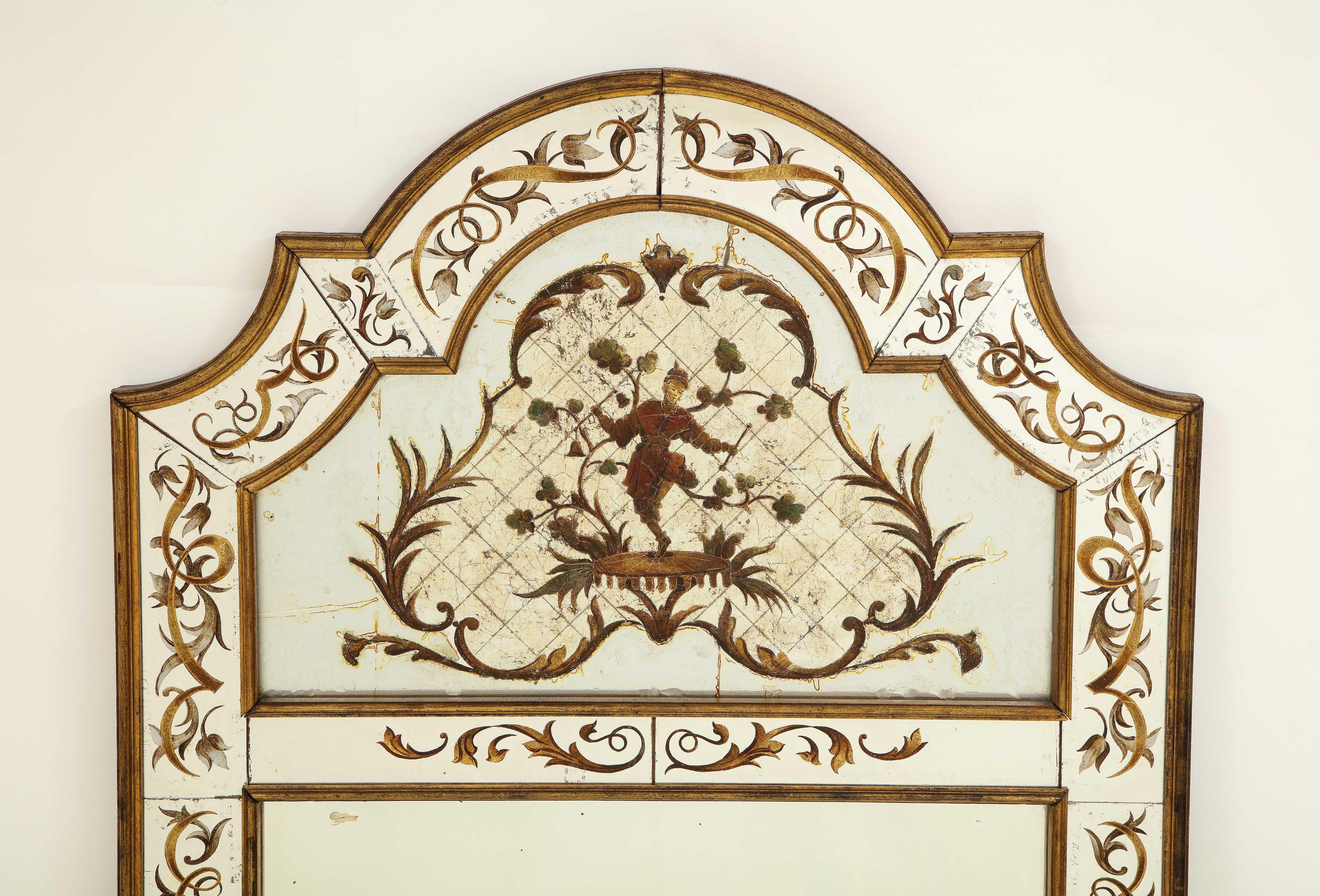 Of arched form, with gilt edged border plates decorated with gilt arabesques and jasmine sprays, the cresting centered by an arched plate centered by a Chinese man dancing on a palanquin within a foliate cartouche.