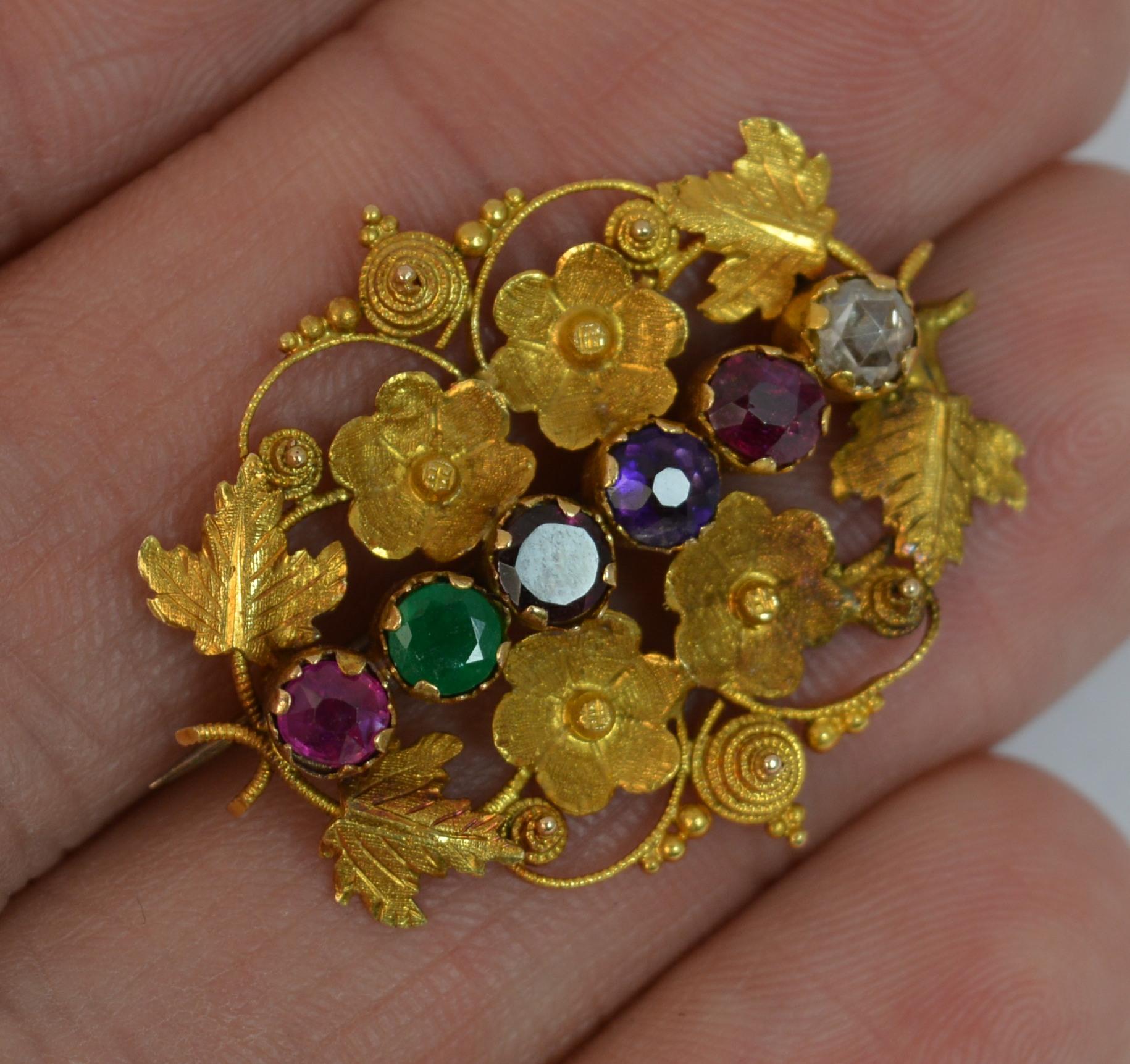 
A superb Georgian period acrostic Regard brooch.

Modelled in 18 carat yellow gold throughout.

Set with gemstones to read regard. Ruby, Emerald, Garnet, Amethyst, Ruby, Diamond. All round cut stones with a rose cut diamond.

The gold work is an