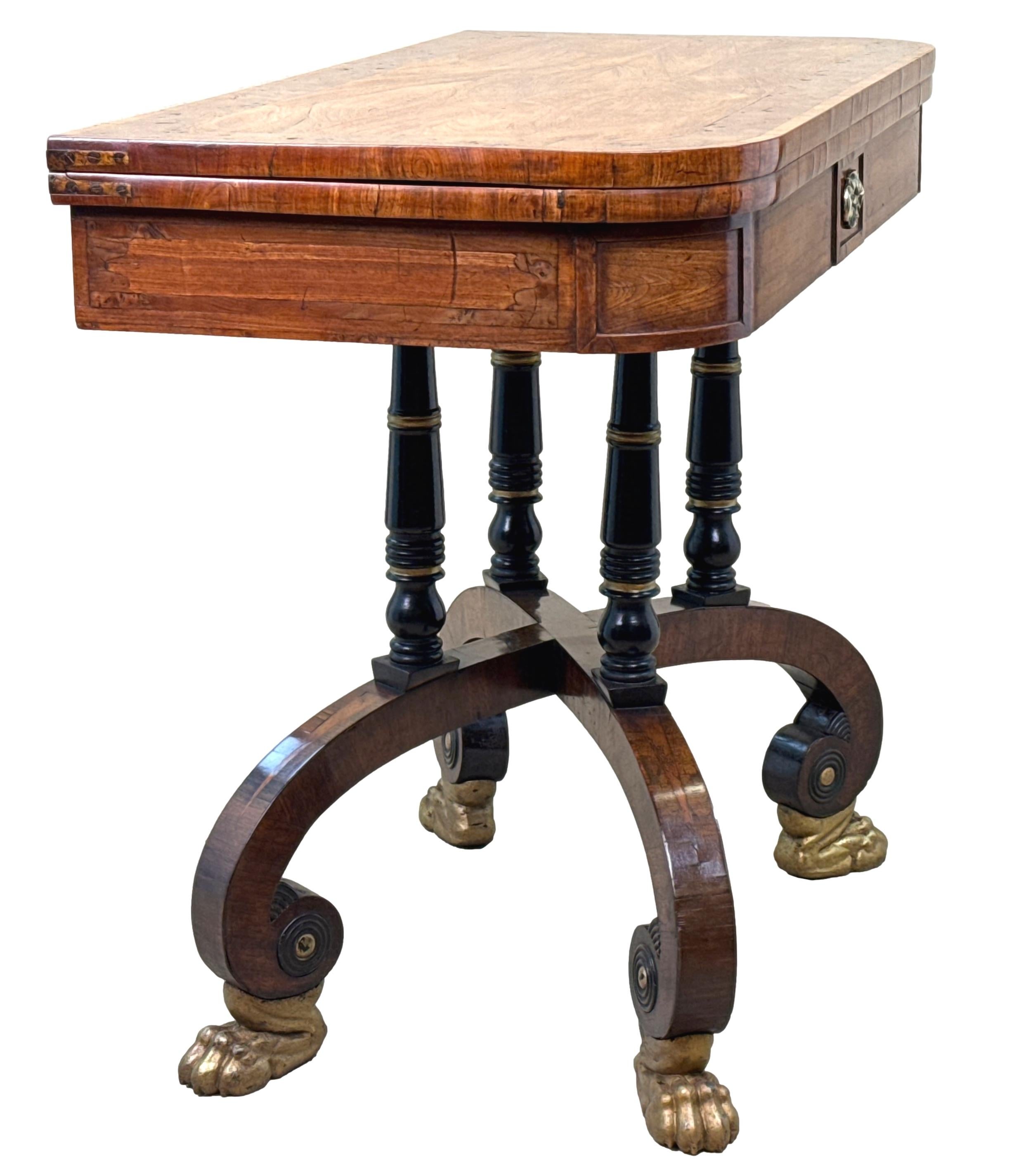 A Rare Early 19th Century Regency Period Kingwood Rectangular Card Games Table, Having Superbly Figured Foldover, Swivel, Top With Attractive Yew Wood Crossbanded Decoration, Enclosing Baized Playing Surface, Over Panelled Frieze With Central Set