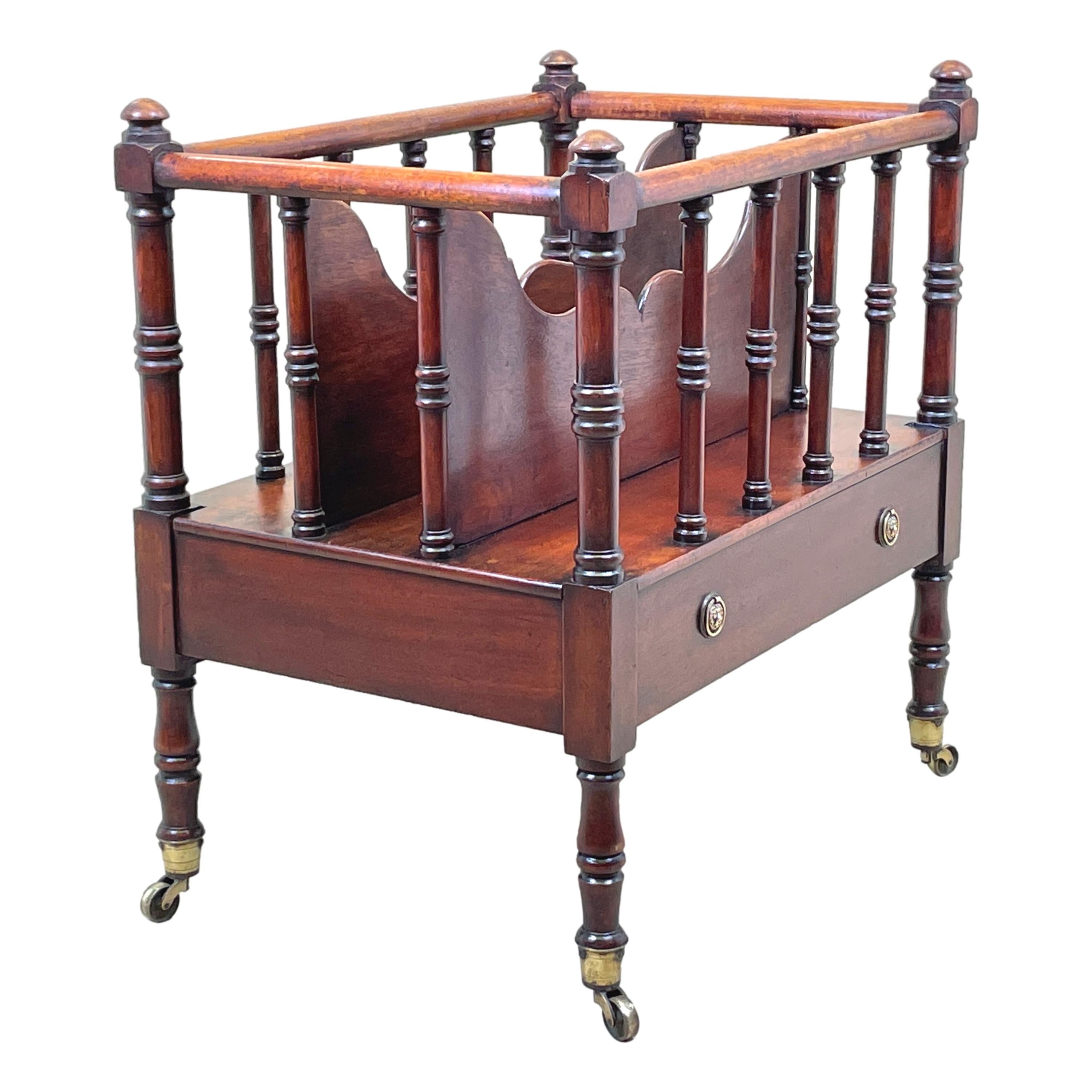 A Very Fine Quality Late Regency Period mahogany Canterbury, Of Unusual Form, With Elegant Turned Spindle Type Supports To Outer Gallery Enclosing Solid Shaped Dividers, Over One Frieze Drawer With Replacement Brass Handles, Raised On Elegant Tall