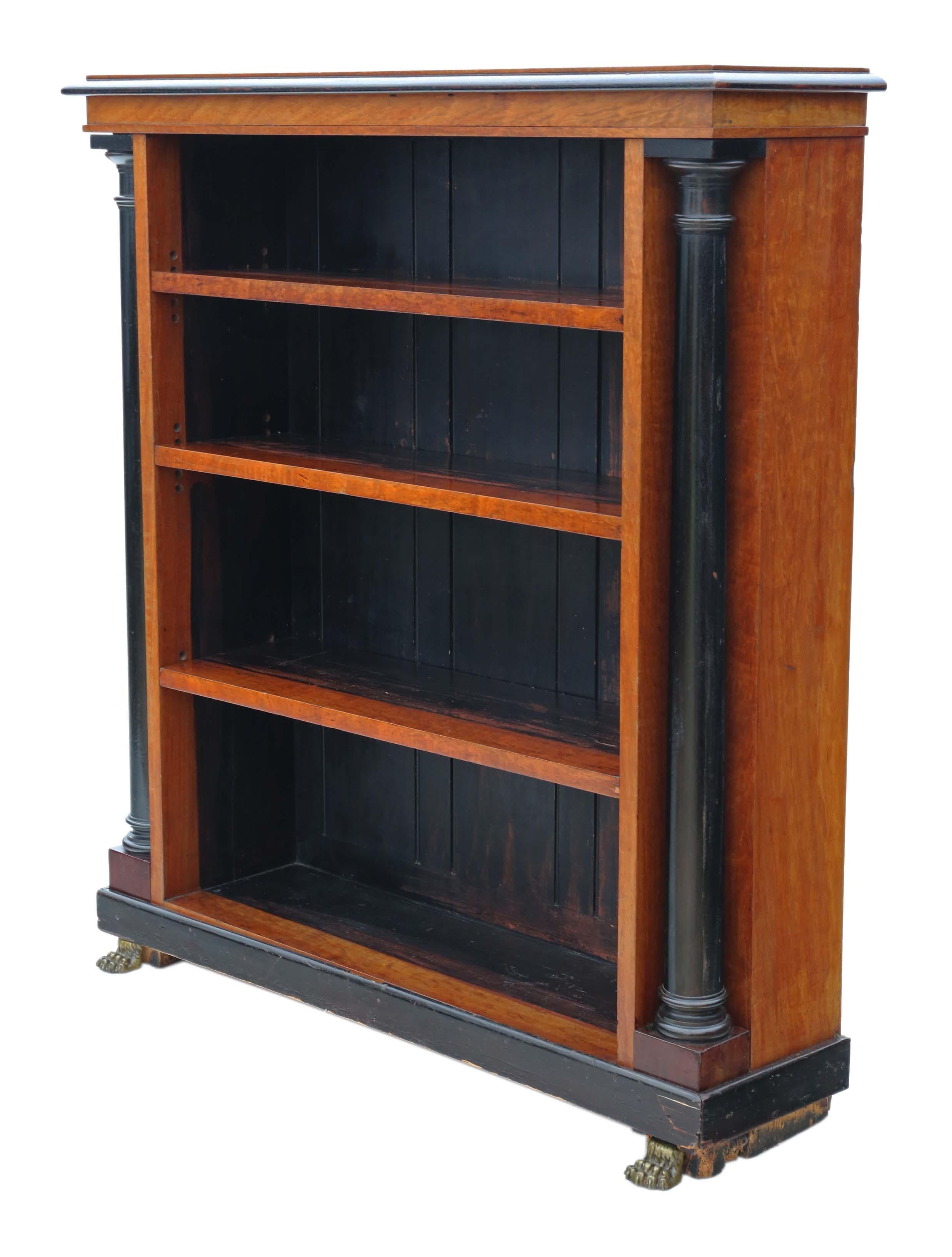 Regency or early Victorian, circa 1820-1850 and later adjustable bookcase.
This is a lovely quality item that is full of age, charm and character. A very decorative piece with amazing ray cut satin walnut and ebonised finishes. The lion's paw feet