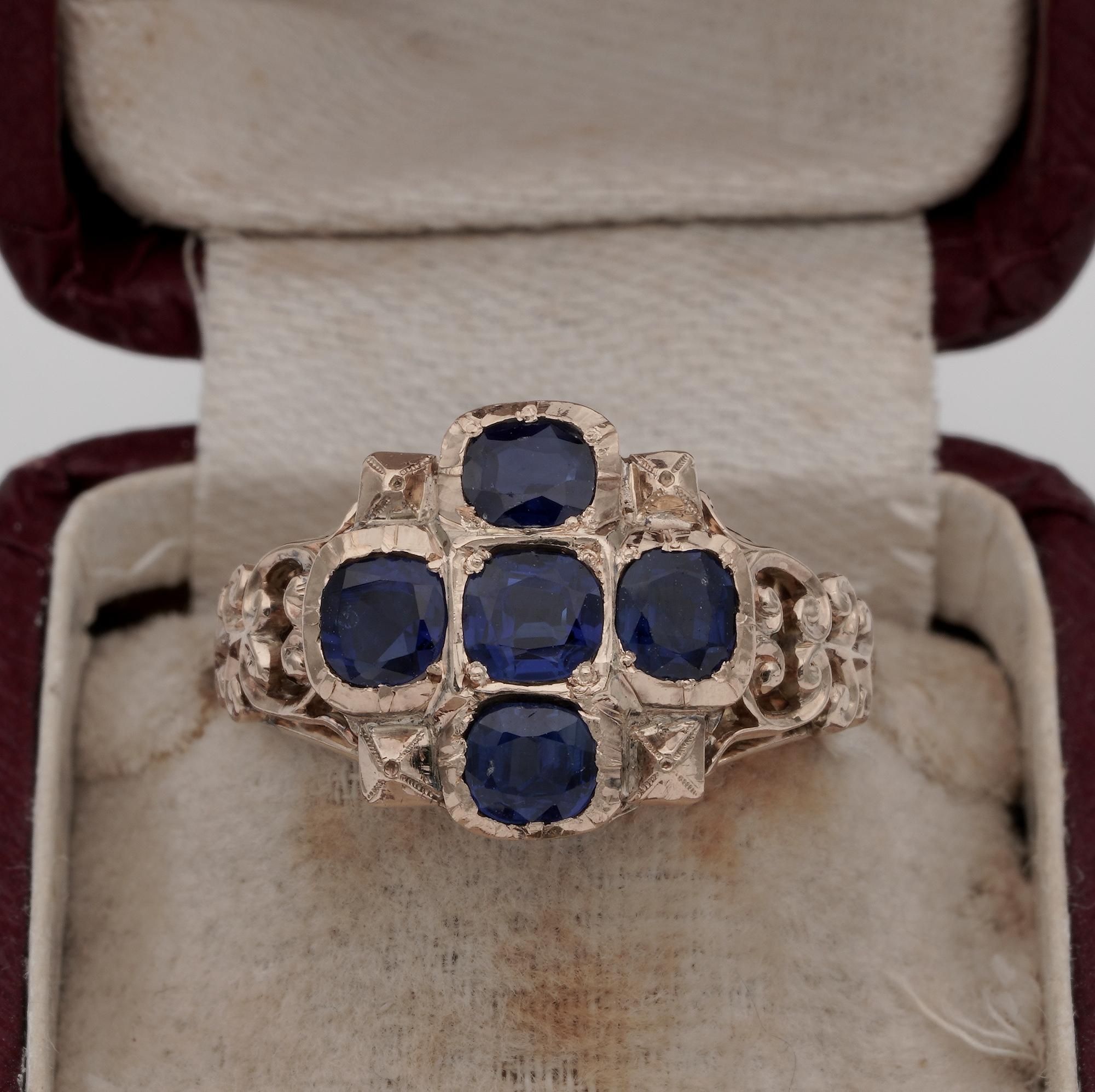 Dreaming the Blue

Rarity ring from 1820 ca
Magnificent representation of beauty of the early 1800 with a distinctive mount richly scrolled- 18 KT tested , bears hallmarks not easy to read, probably French
Crown displays five superb quality antique
