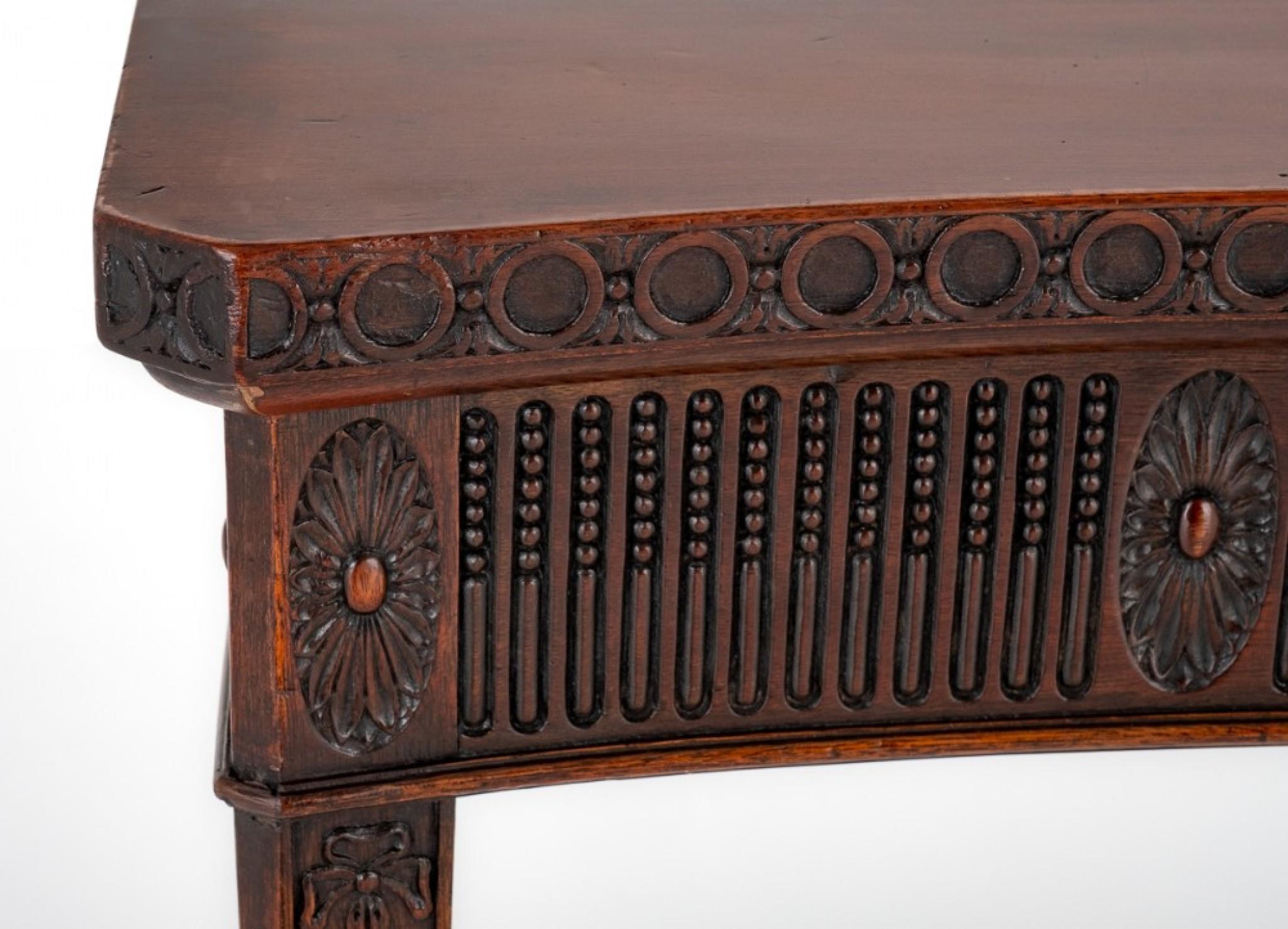 Adams Style Mahogany Server.
This Server is of a Serpentine Form Standing Upon Square Tapered Legs With Spade Feet and Feature Carved Harebells.
Circa 1860
The Front and Sides of the Server Having Carved Detail.
Having a Central Panel Featuring a