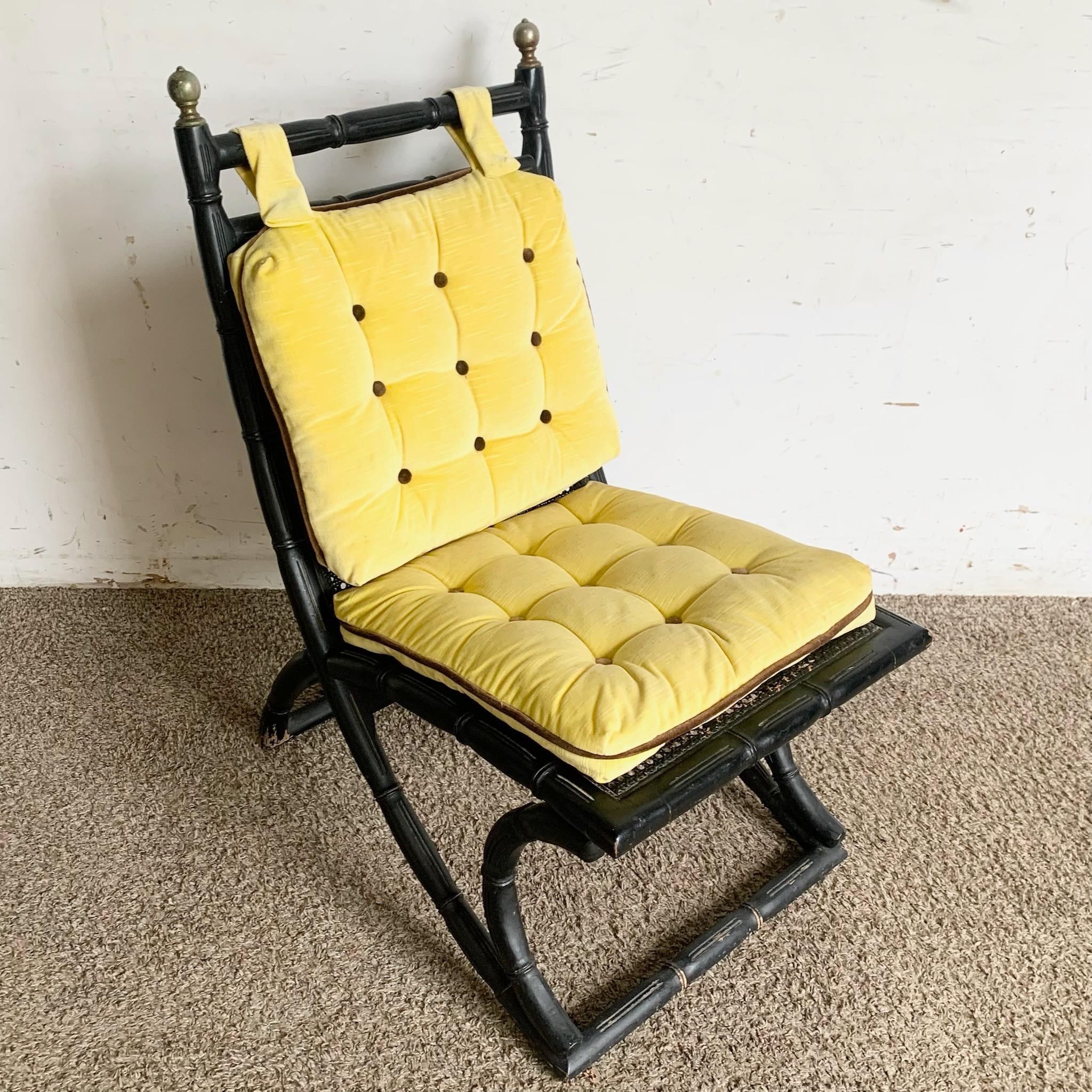 Late 20th Century Regency Black Faux Bamboo and Cane Chair With Tufted Yellow Cushions