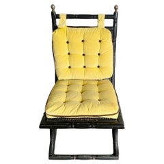Regency Black Faux Bamboo and Cane Chair With Tufted Yellow Cushions