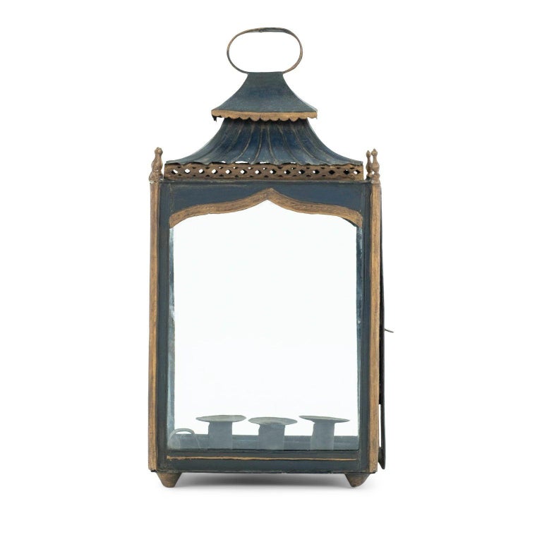 Regency dark-blue, almost-black painted tole wall lantern circa 1815-1820. Decorated in gilded detail. All sides are glass paneled. Three tole candle holders inside lantern. Not wired. Can be near-pair with lantern ref. 962A (see last image).
